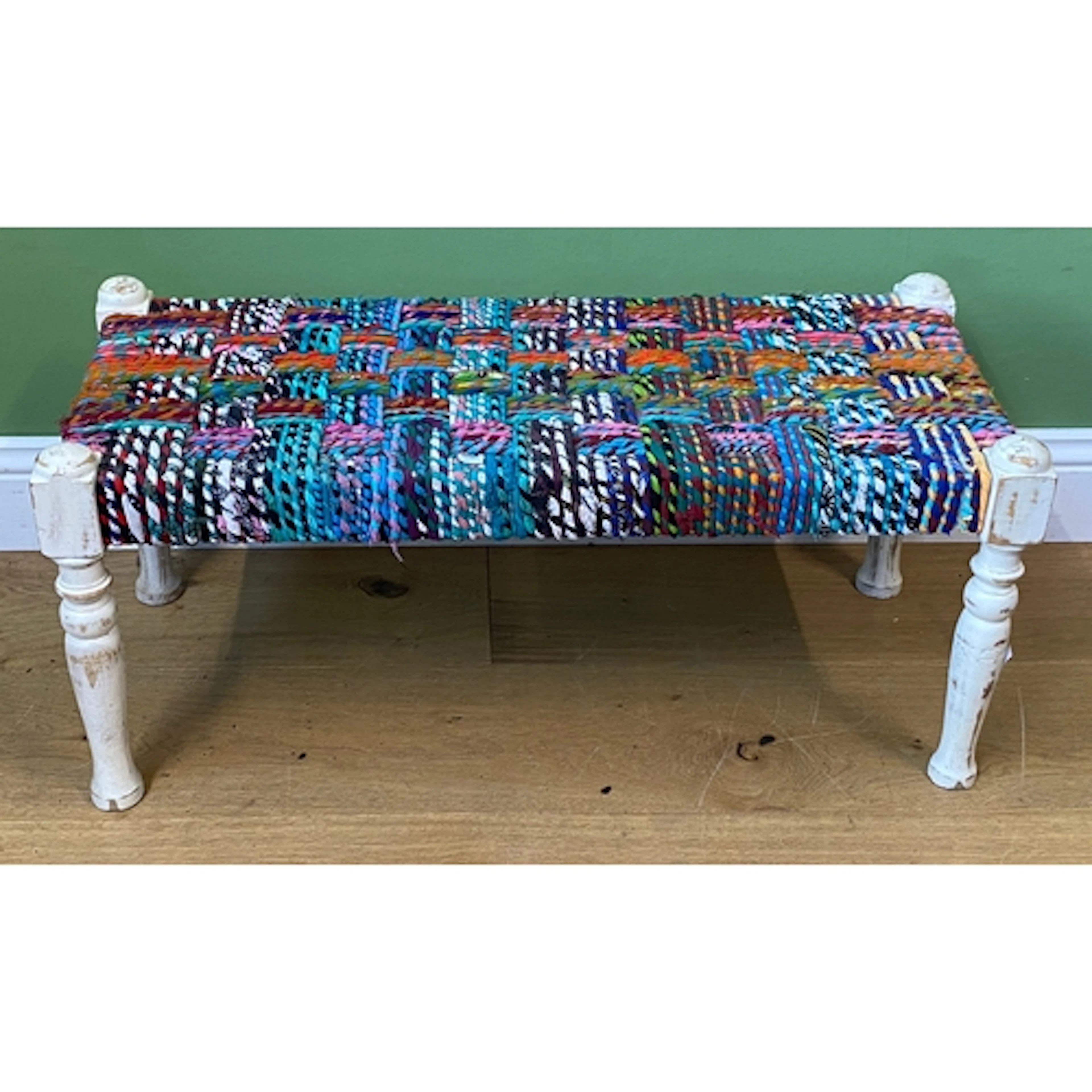 A rectangular stool with rag upholstered top, 40x90x39cmH; t...