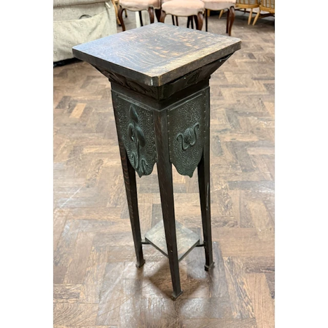 An Art Nouveau oak plant stand with copper panels, top 10" s...