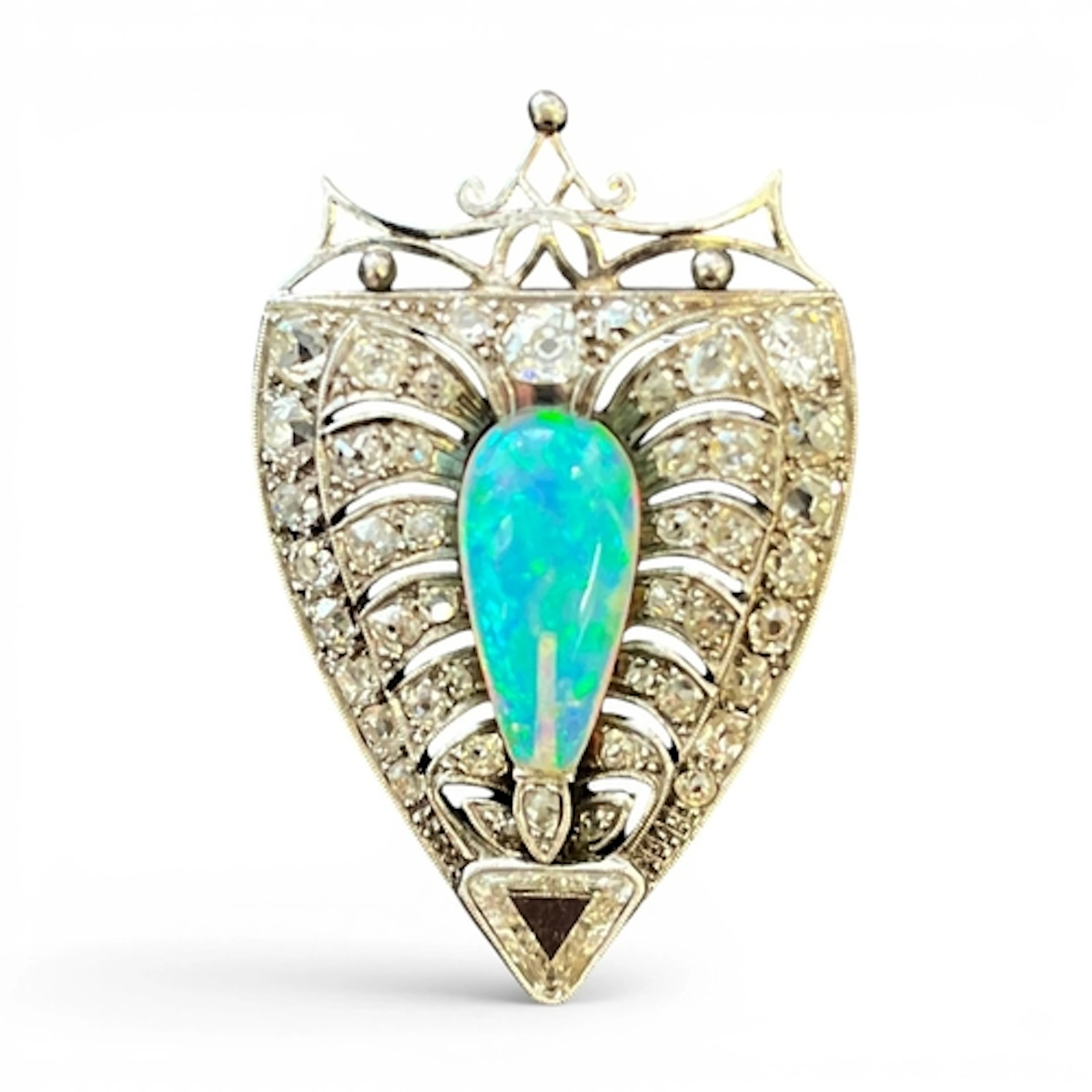 A BELLE EPOQUE DIAMOND OPAL AND PLATINUM BROOCH. of shield s...