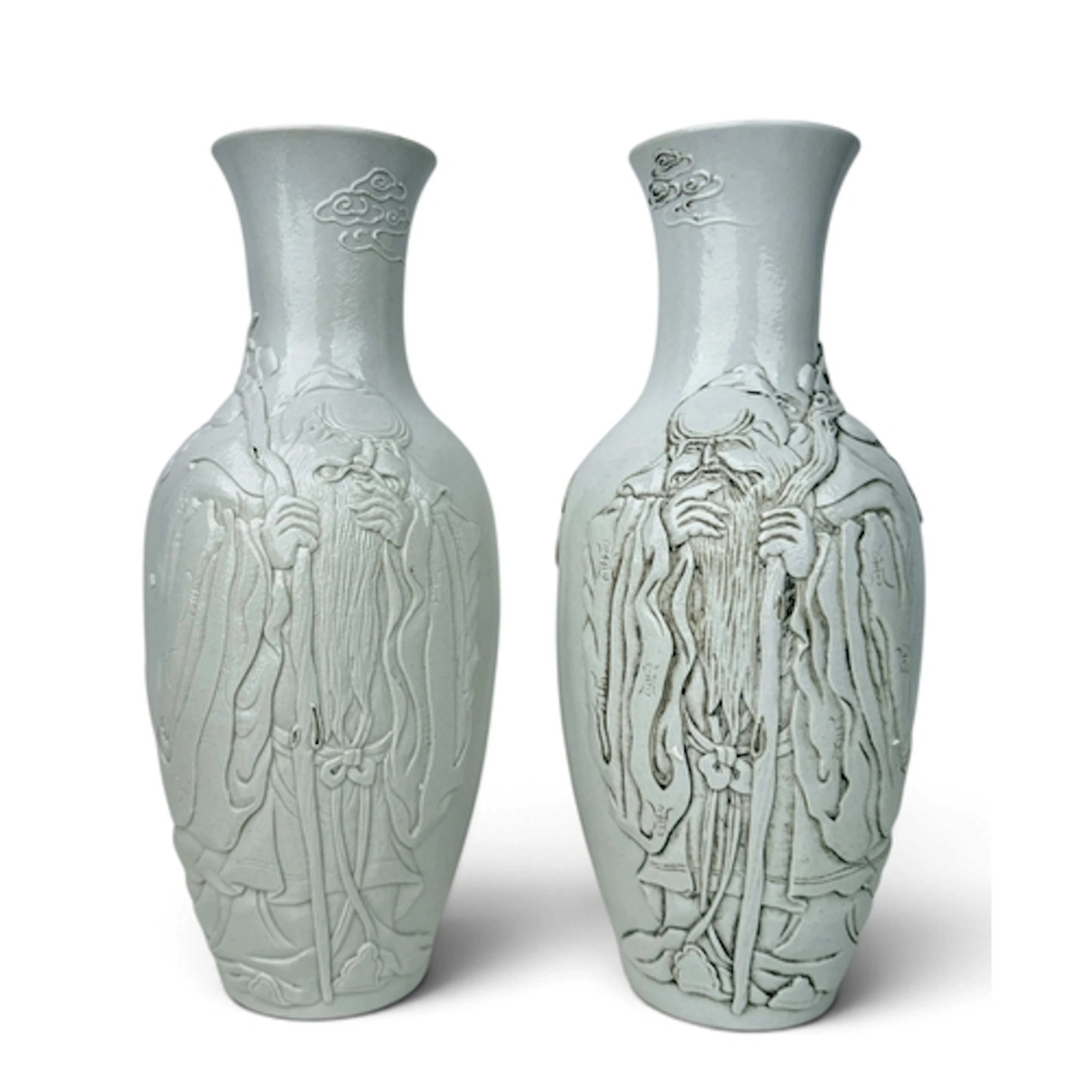 A PAIR OF CHINESE BLANC DE CHINE CARVED CERAMIC VASES Decora...