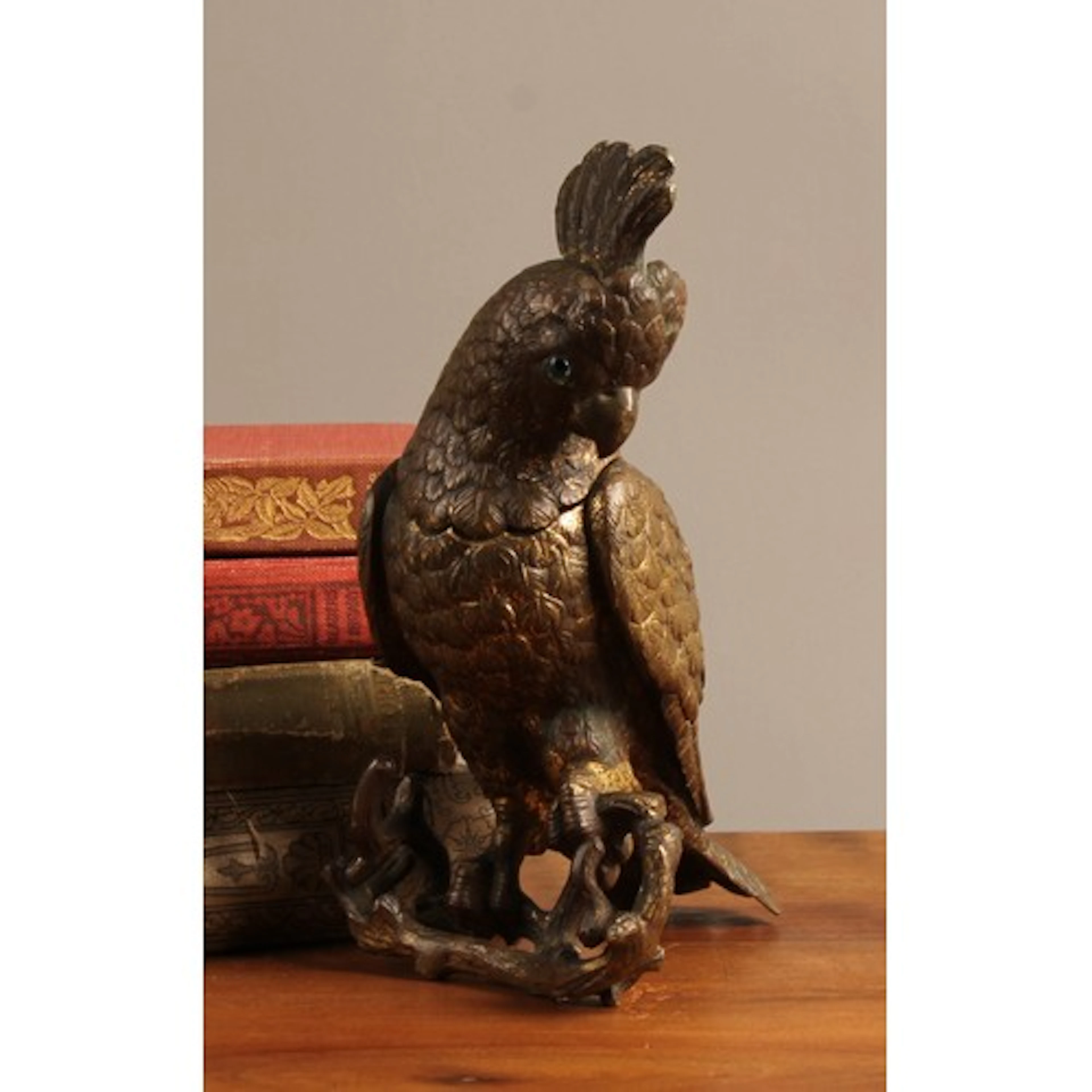 A Victorian gilt bronze novelty inkwell, as a cockatoo, perc...