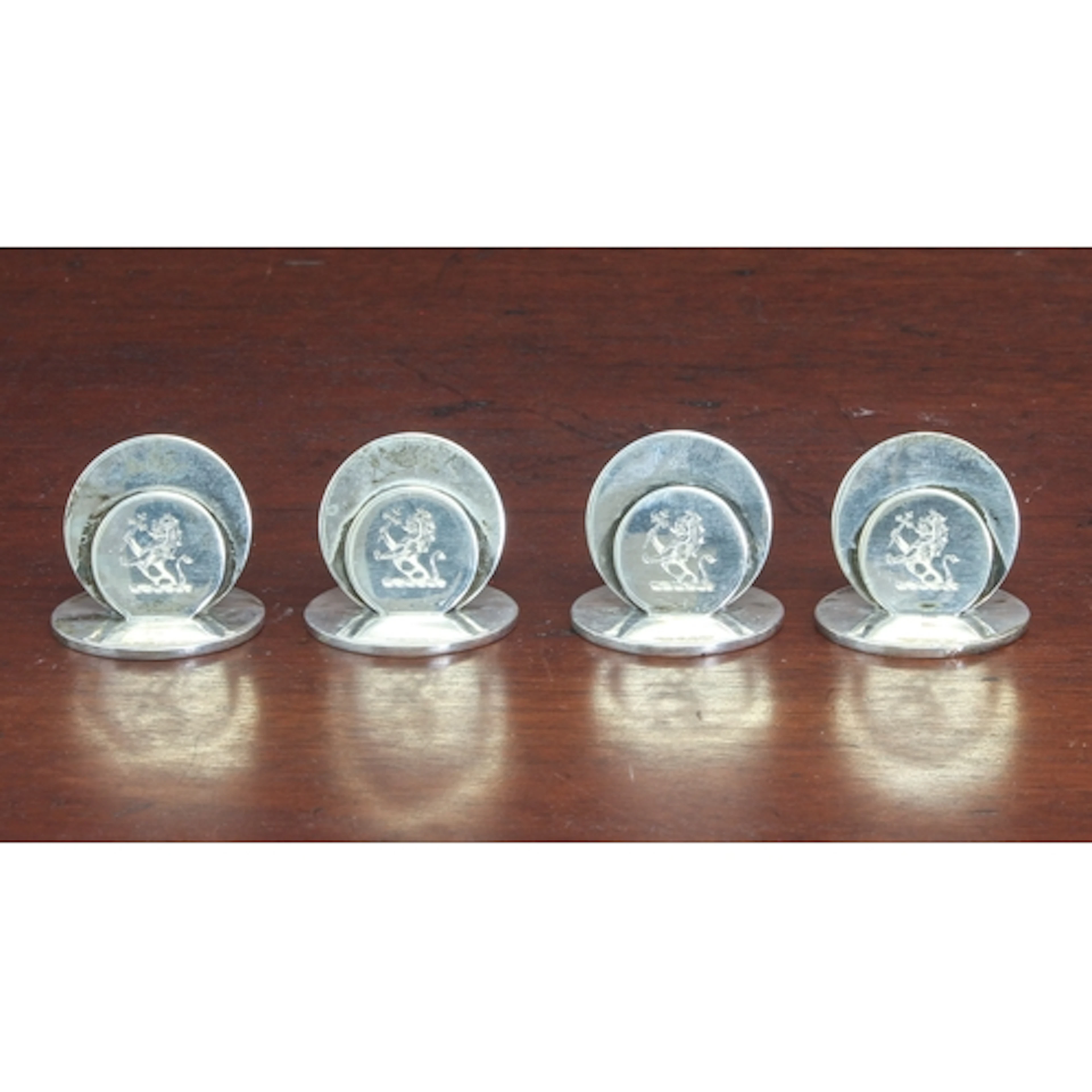 Were family interest: a cased set of four George V silver pl...