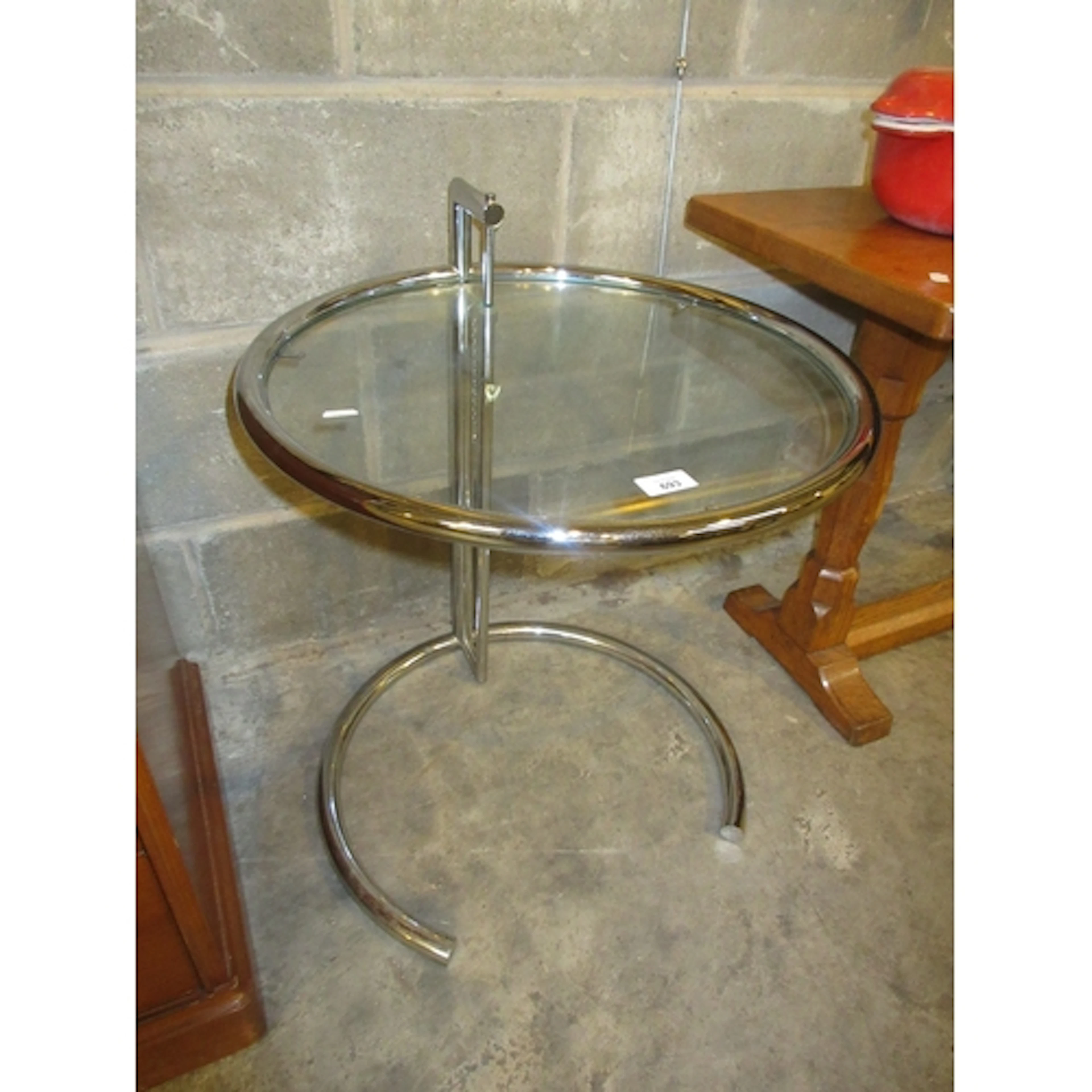 After Eileen Gray, a Circular Glass and Chrome Adjustable He...