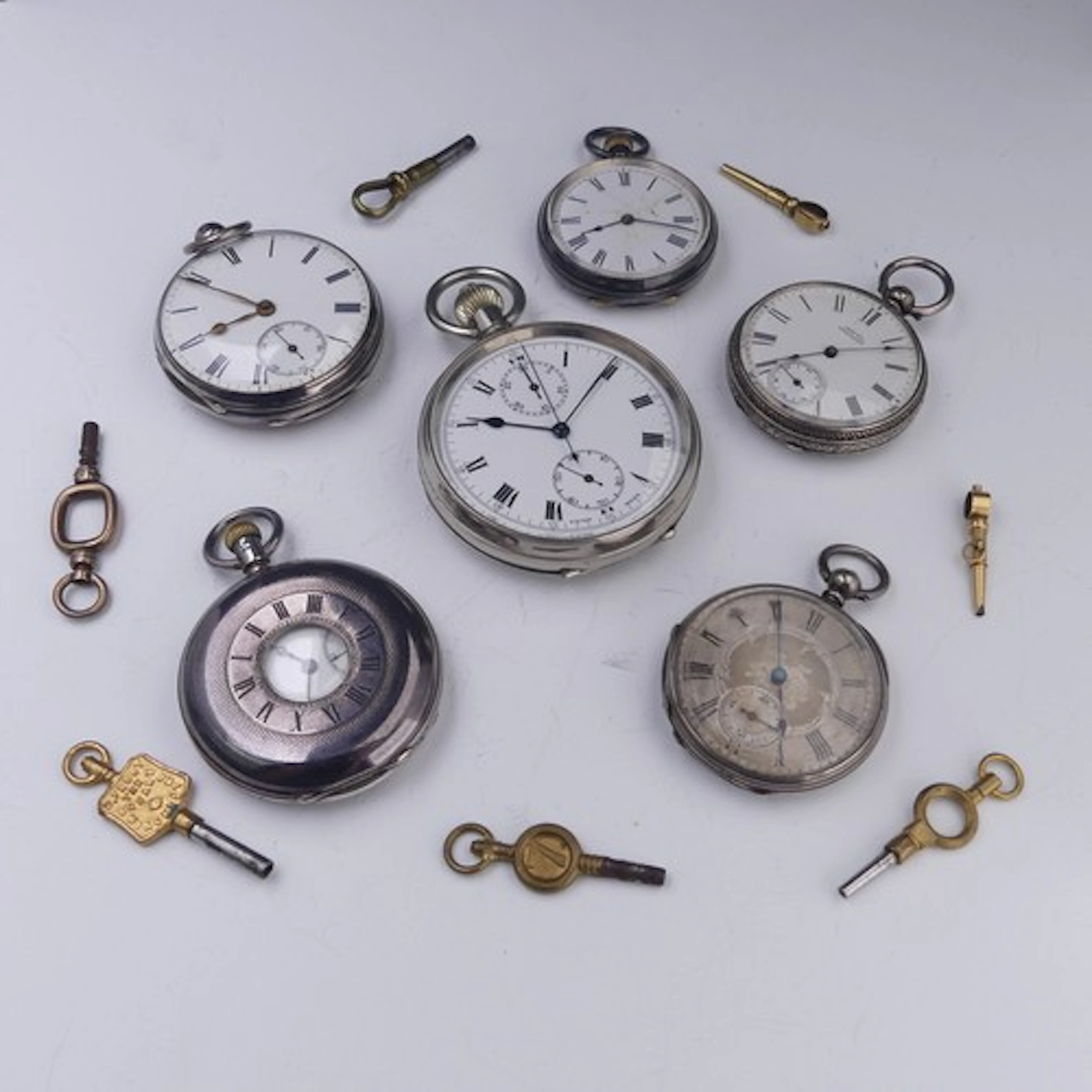 A Victorian silver Pocket Watch, the white enamel dial with ...