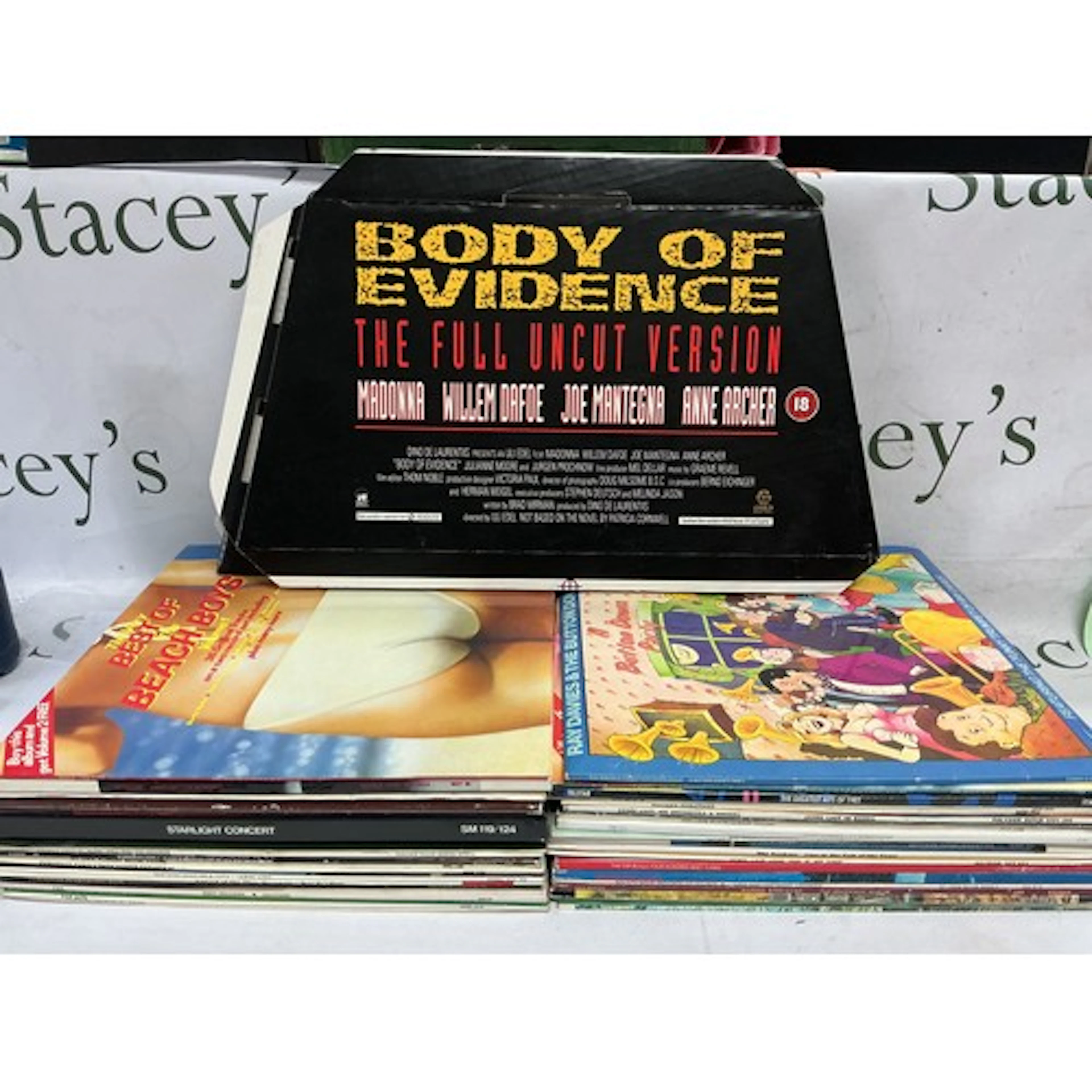 Three bags of LPs by various artists including ABBA, Beach B...
