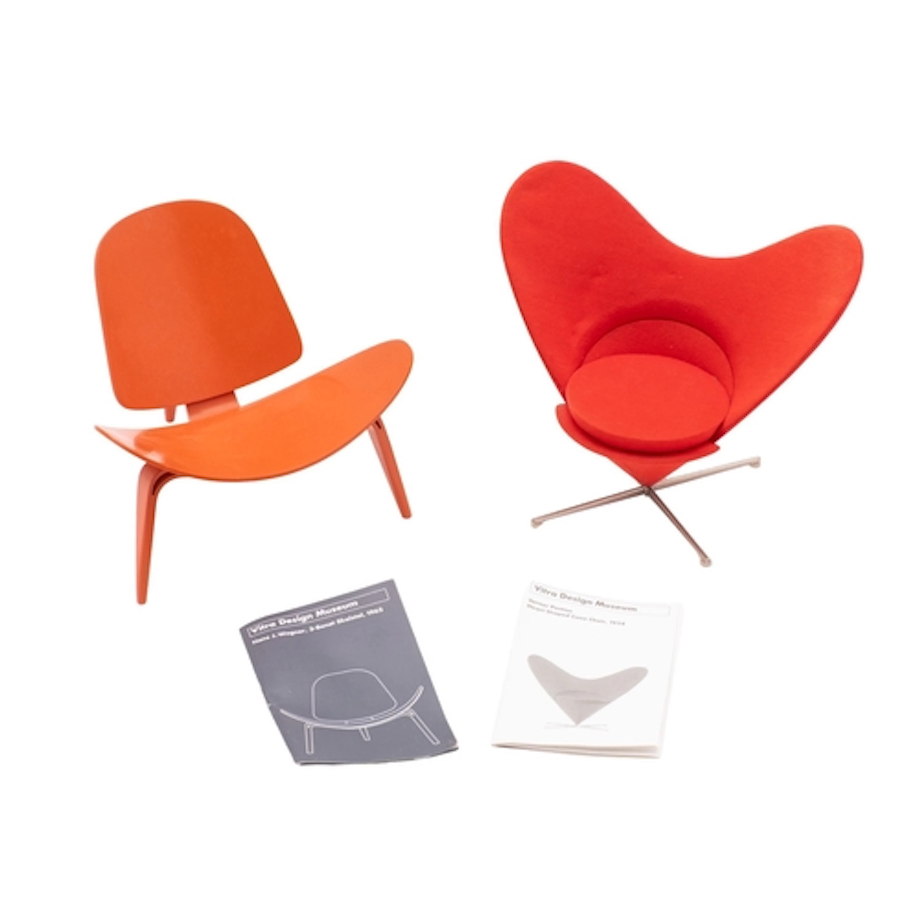 Two miniature Vitra models of upholstered chairs, modern; in...