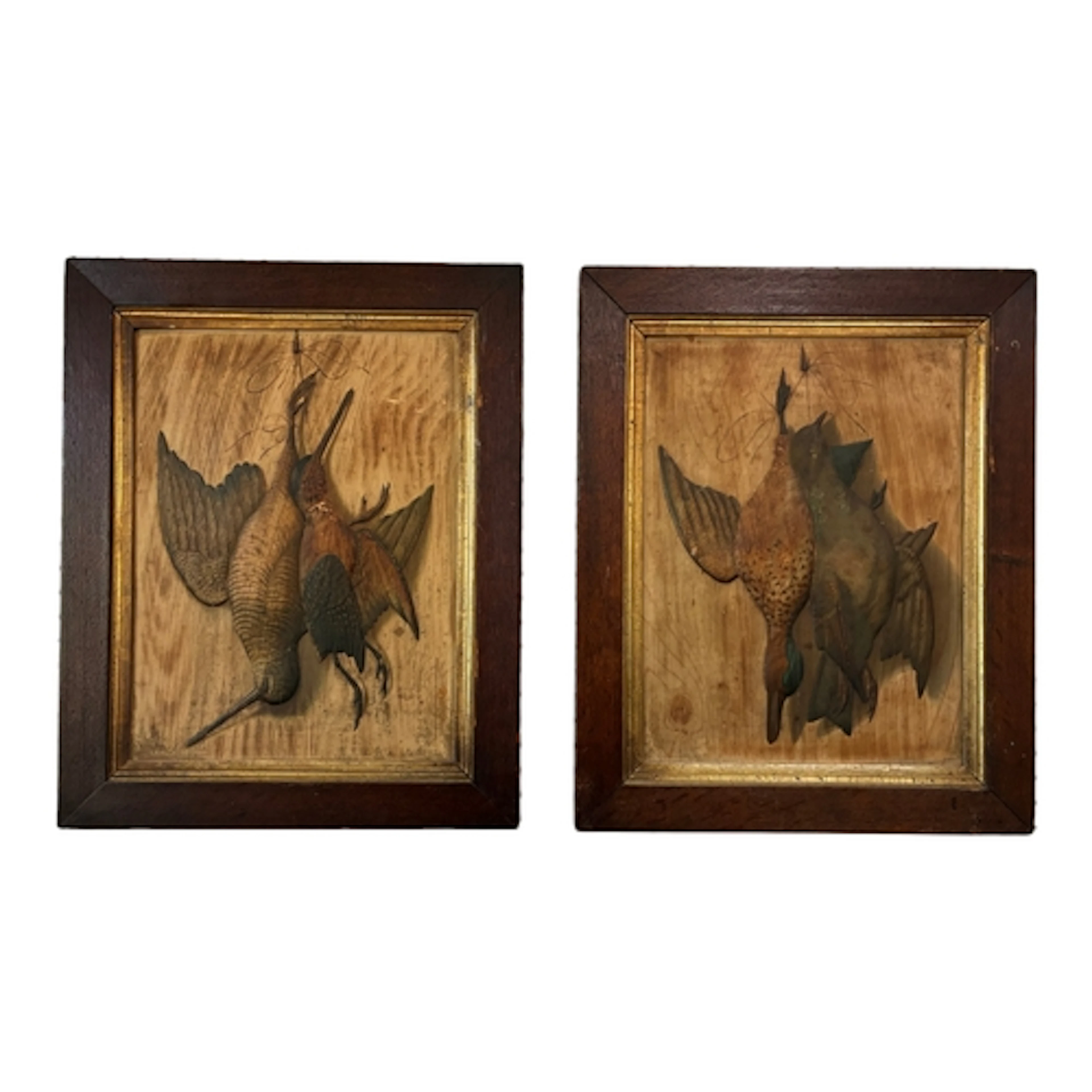 A pair of German 'reliefbild' pictures showing hanging game,...