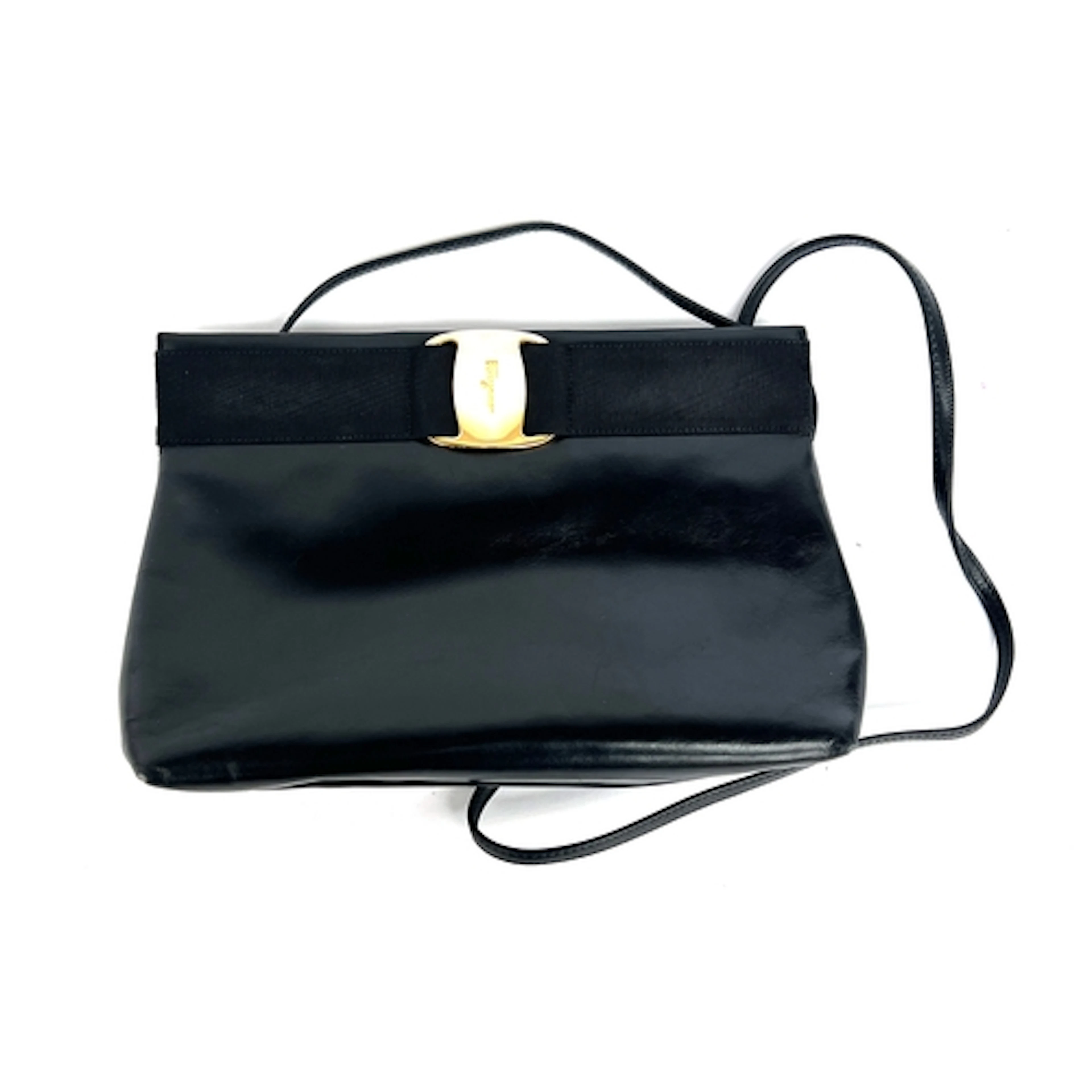 A Ferragamo black leather vara bow crossbody/clutch bag, ser...
