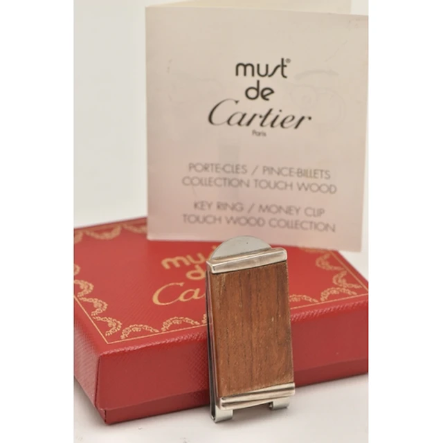 A MUST DE CARTIER 'PINCE-BILLETS' TOUCH WOOD COLLECTION MONE...