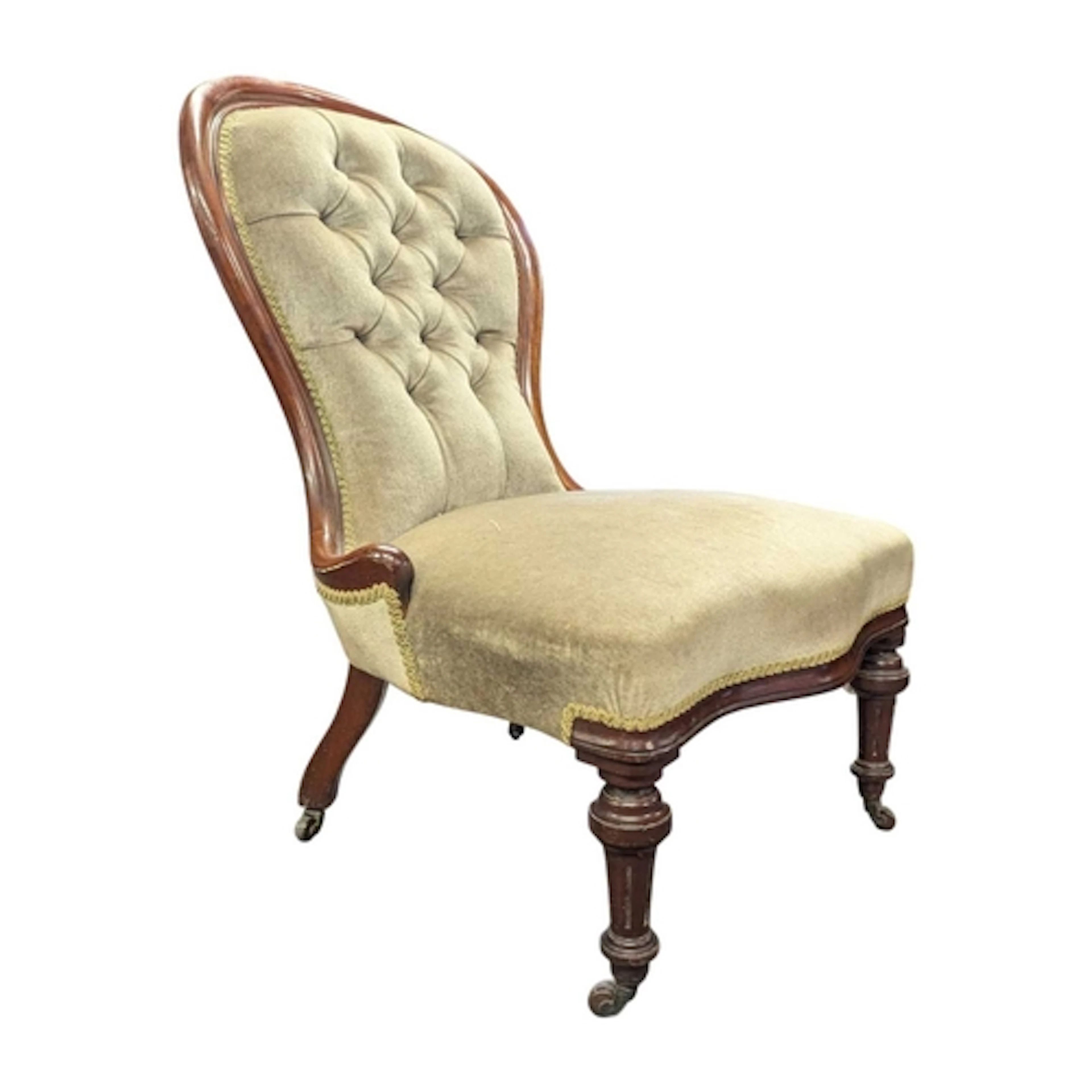 A Victorian 19th century mahogany spoon back ladies armchair...