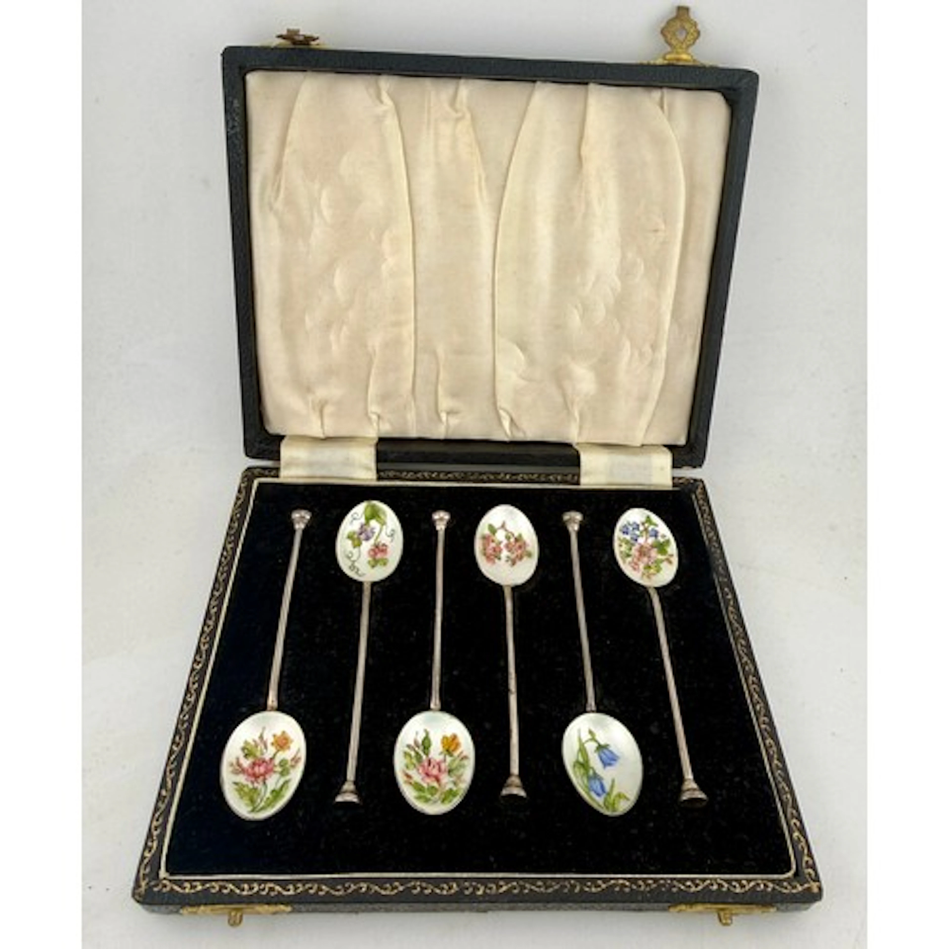 A set of six cased silver and floral enamel spoons. Birmingh...