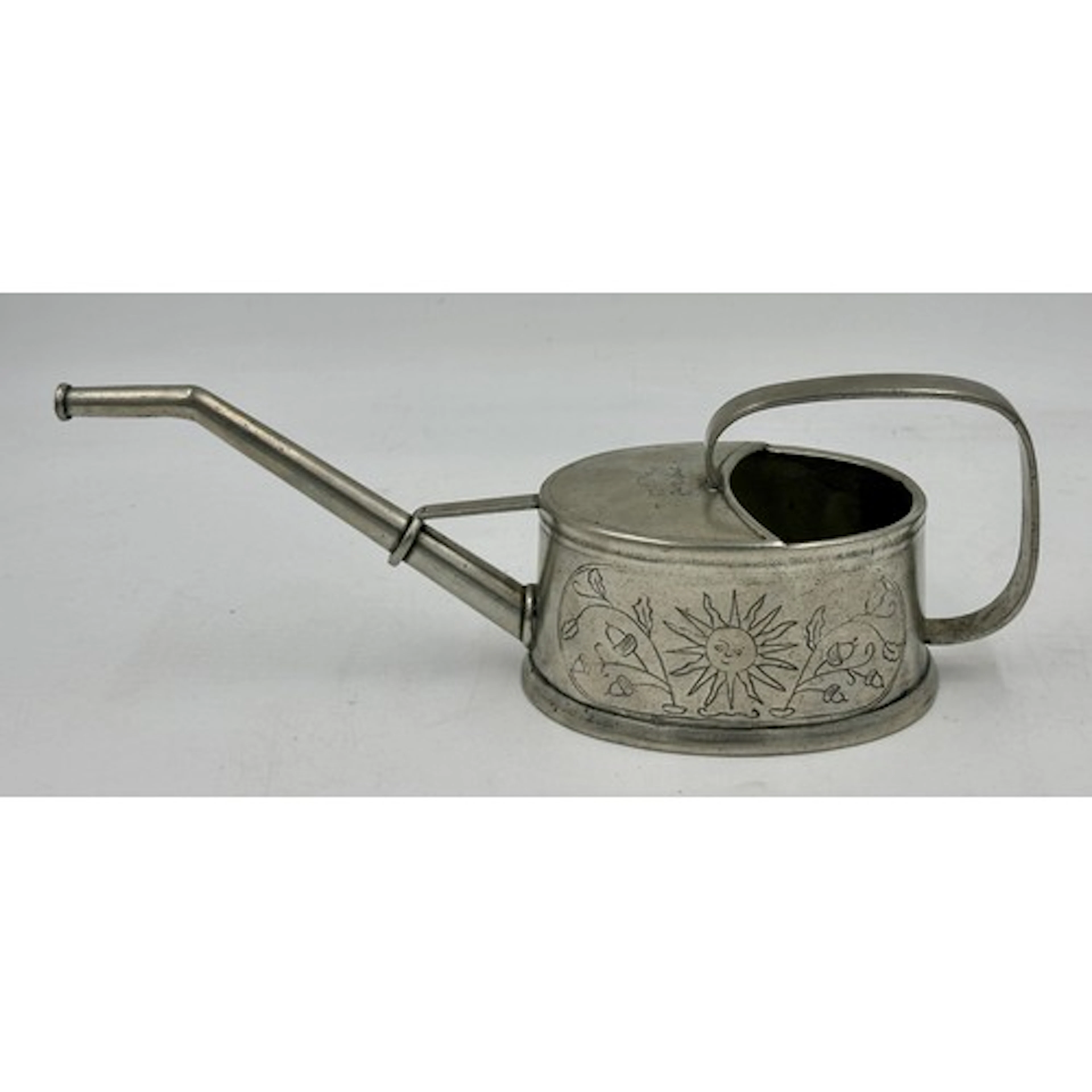 Tavola Marinoni, an Italian pewter watering can with an aged...