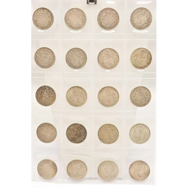 Silver. A page from a coin album containing 20 x King George...