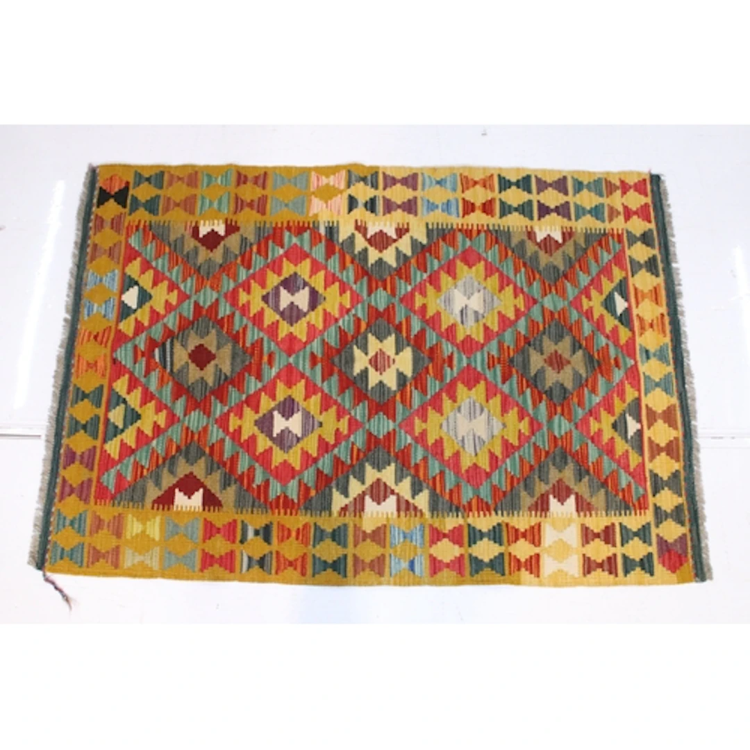 Maimana Kilim rug, having yellow ground with geometric accen...