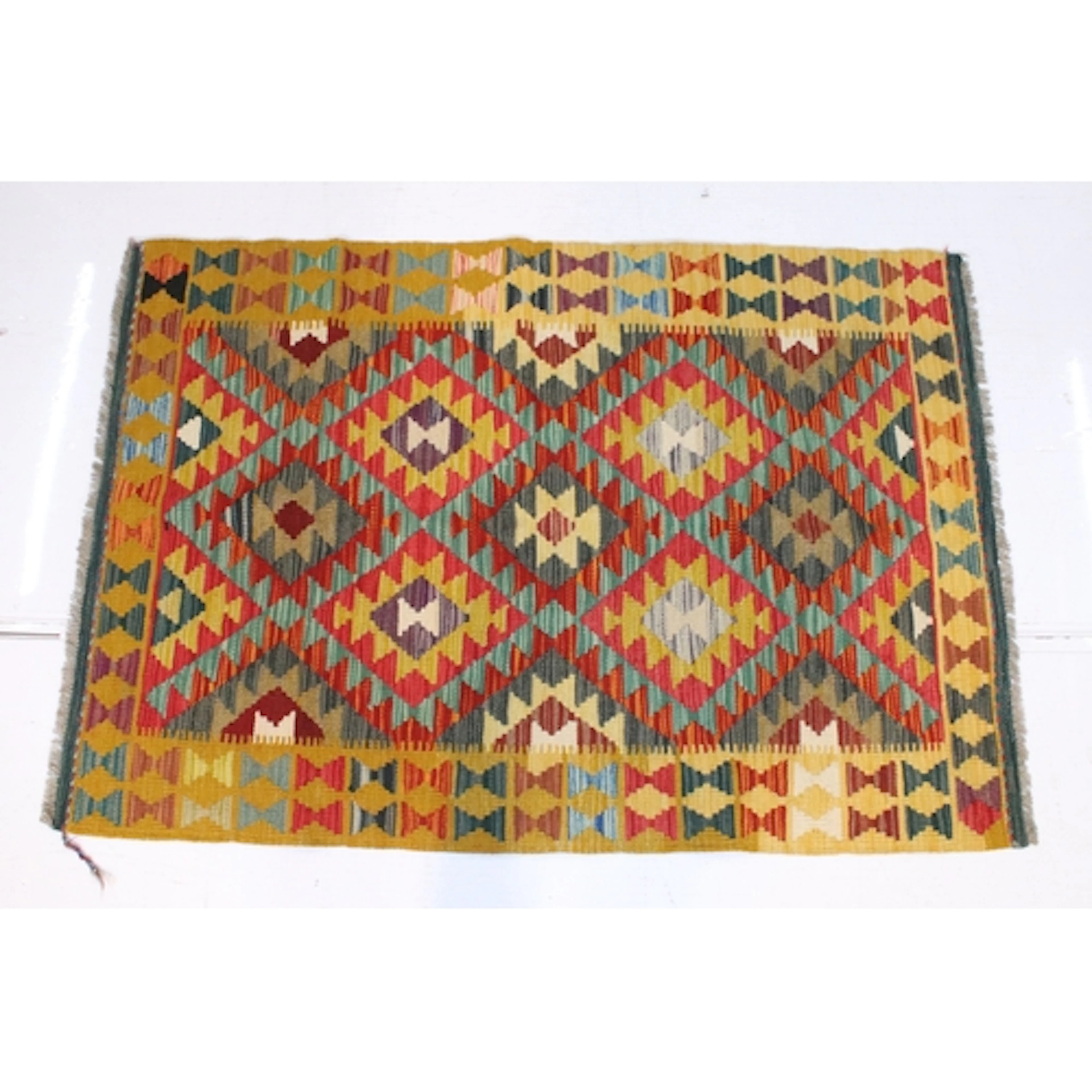 Maimana Kilim rug, having yellow ground with geometric accen...