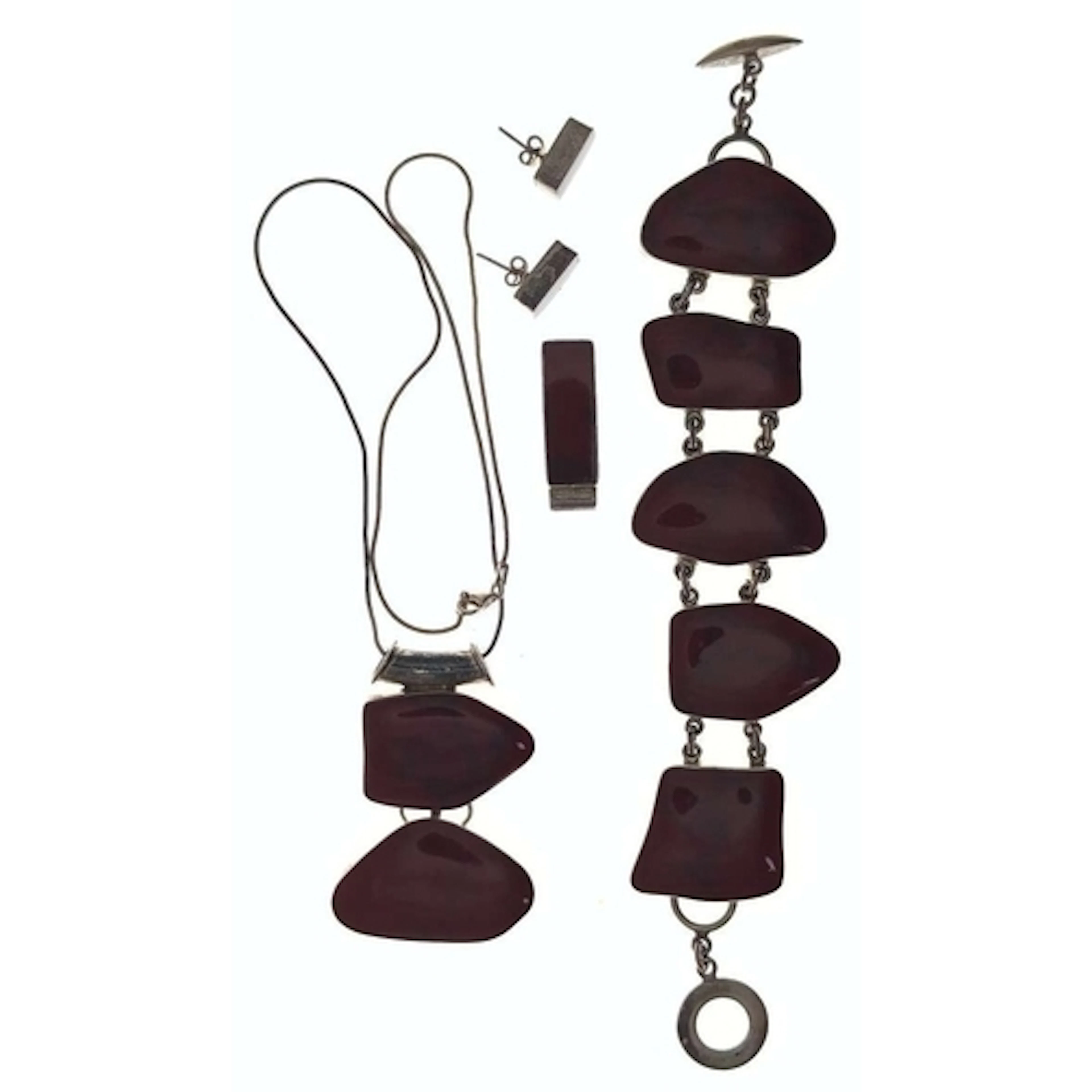 Silver and red jasper jewellery, including two pendants (one...