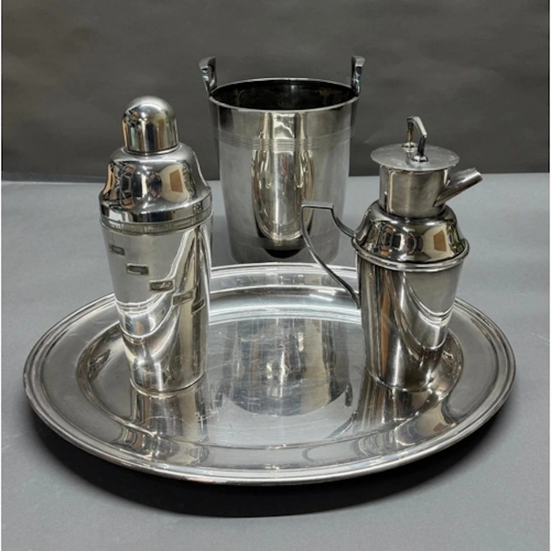 A selection of silver plate tp include trya, ice bucket, coc...