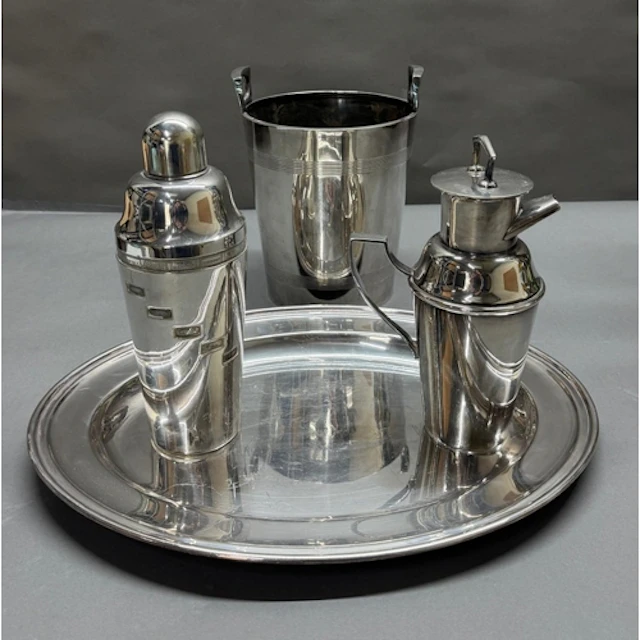 A selection of silver plate tp include trya, ice bucket, coc...