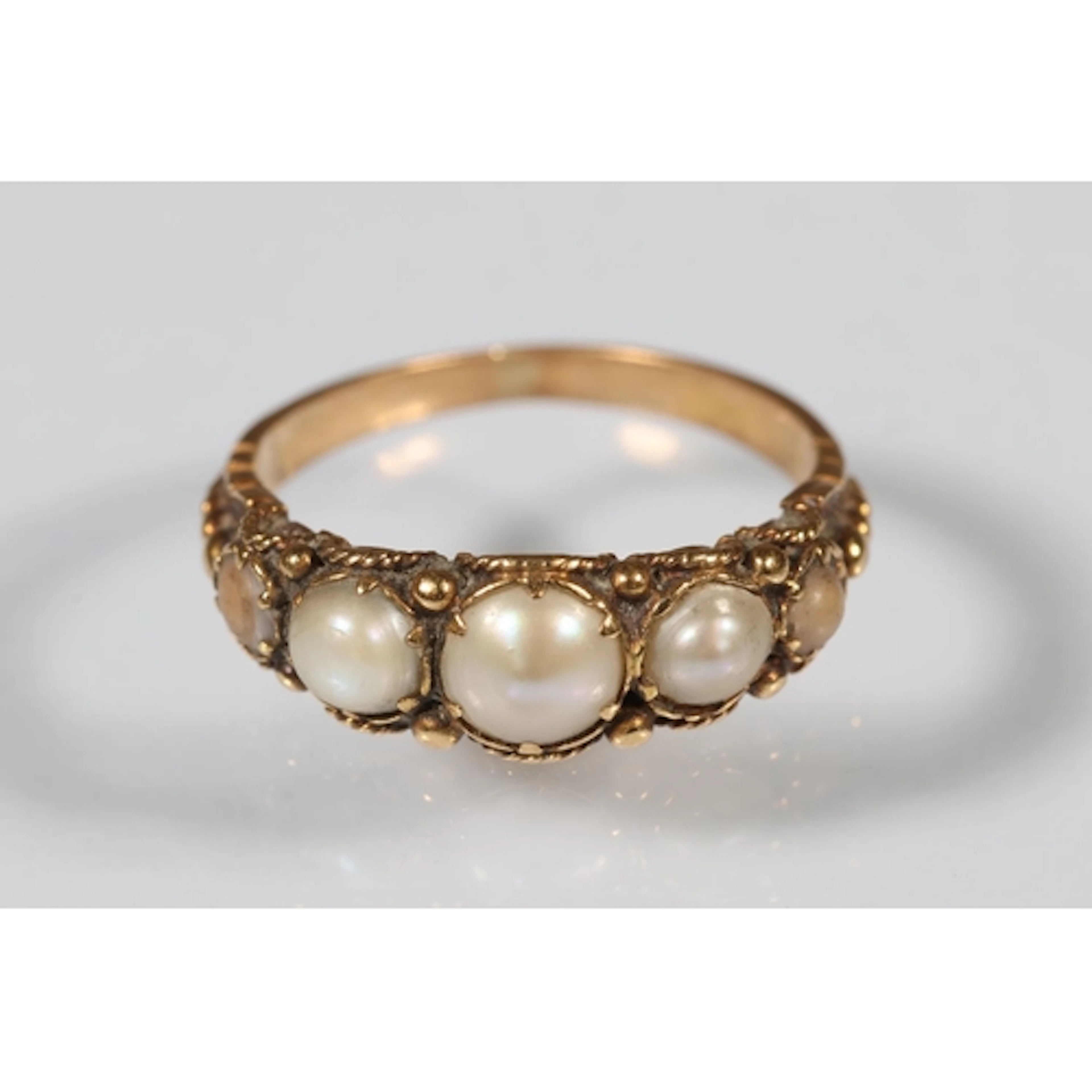 Antique gold tone ring set with five pearls, size M, 2.5g gr...