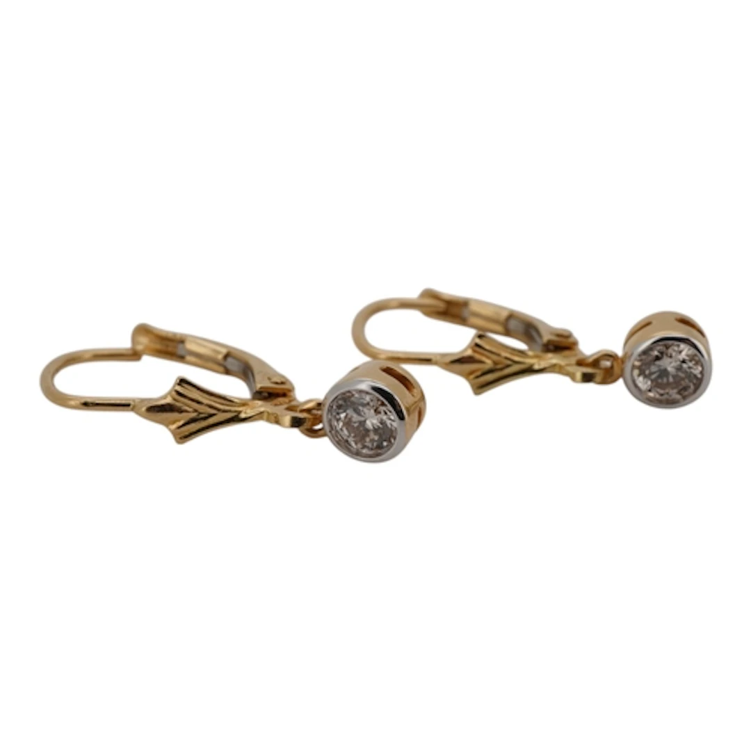 A pair of diamond drop earrings, composed of gold hoops susp...