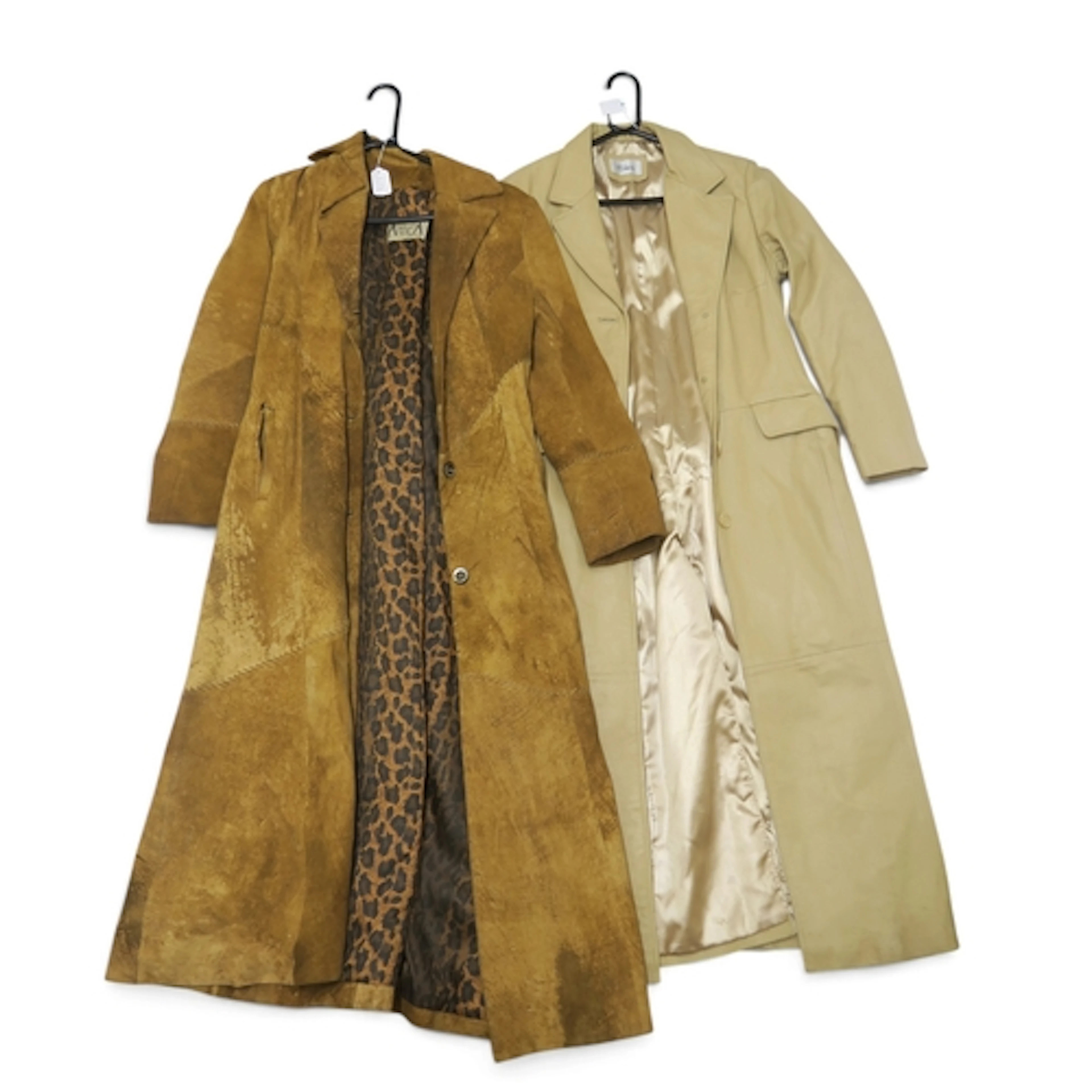 A dark brown fur jacket, a long beige leather coat, a suede ...