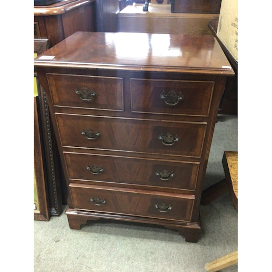 A mahogany chest of drawers of small size with two drawers a...