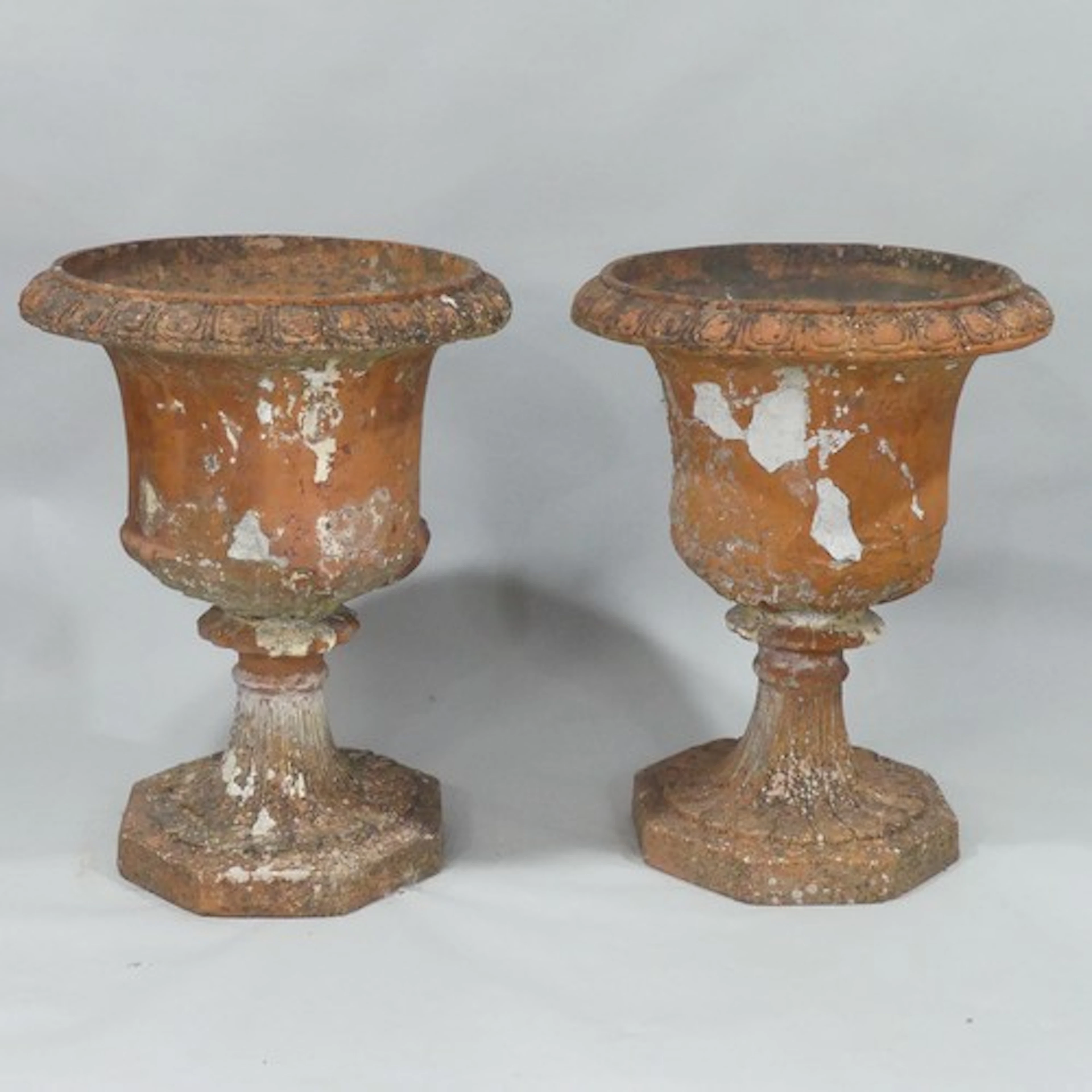 A pair of Victorian classical style terracotta garden Urns, ...