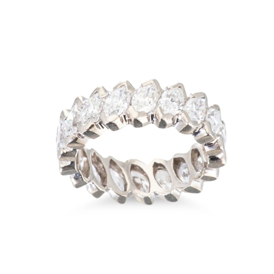 A FULL BANDED DIAMOND ETERNITY RING, set with marquise cut d...