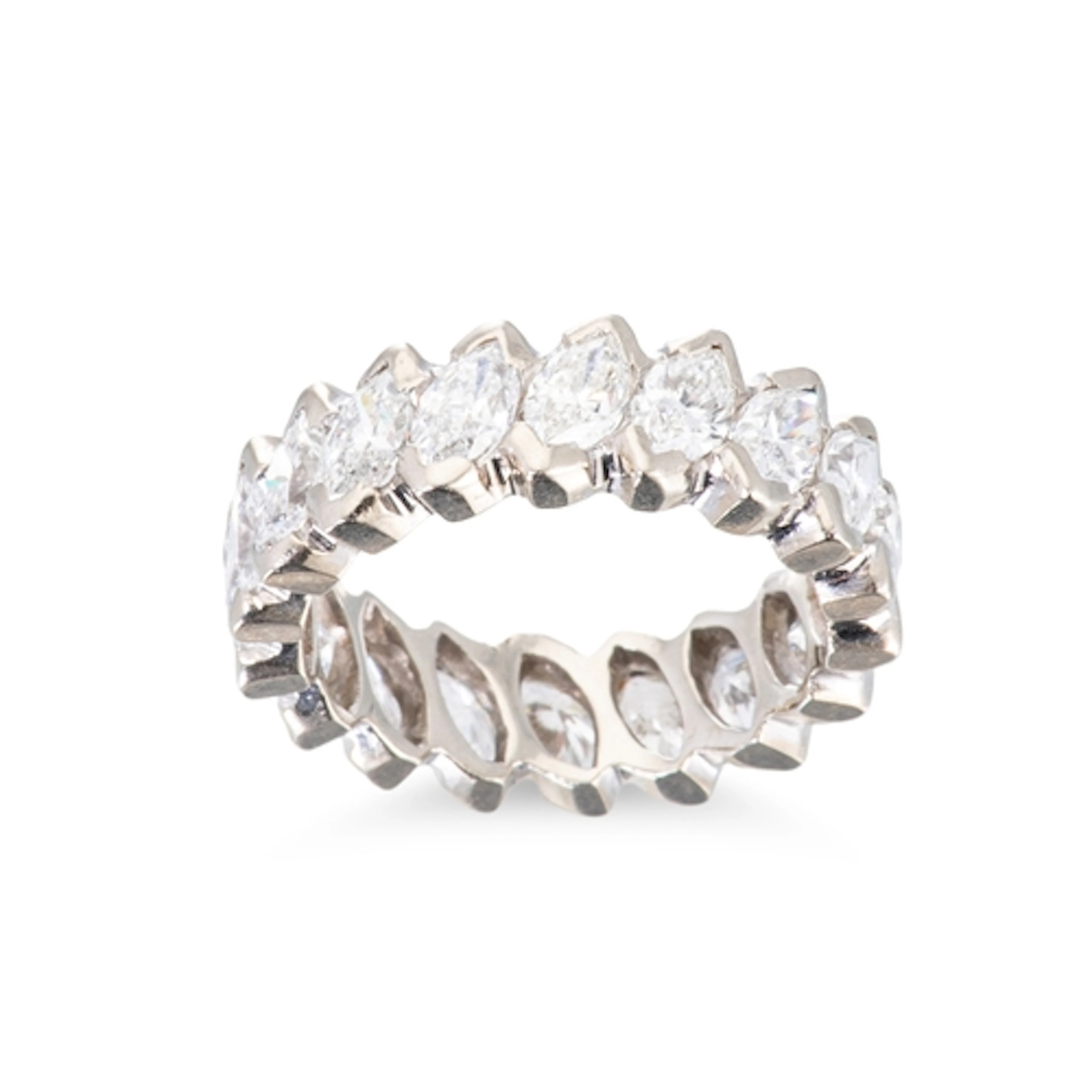 A FULL BANDED DIAMOND ETERNITY RING, set with marquise cut d...
