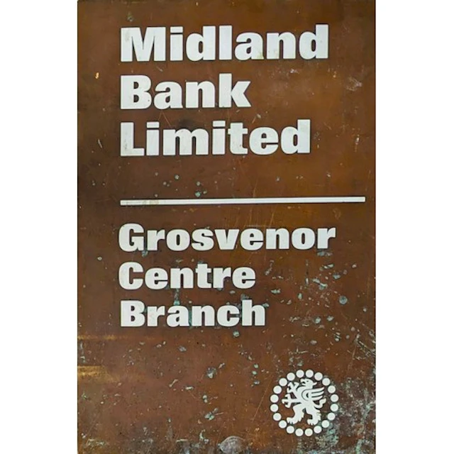 Advertising - Banking - a bronze rectangular plaque or sign,...