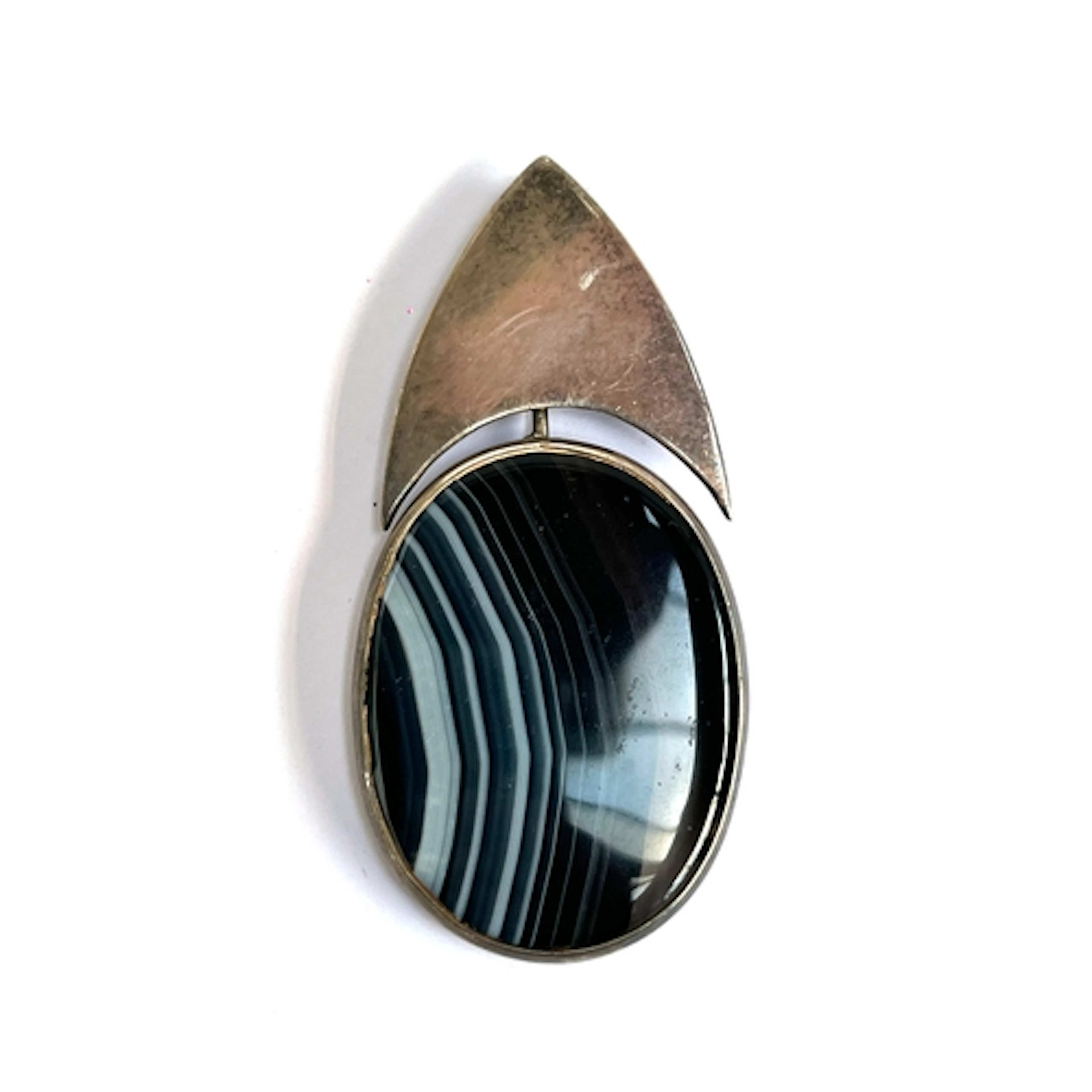 A modernist silver and banded agate pendant, hallmarked MB, ...