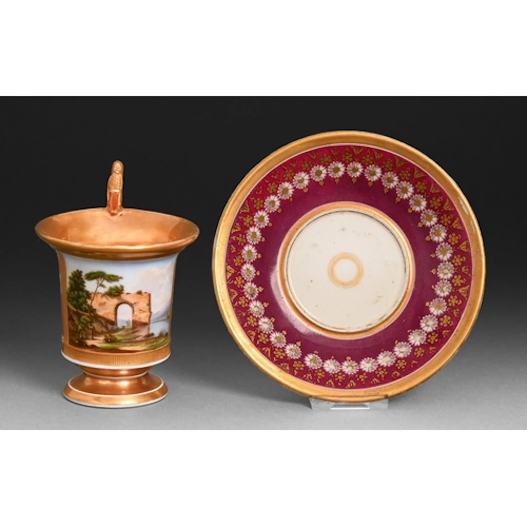 A Paris porcelain cabinet cup and saucer, c1830, painted wit...