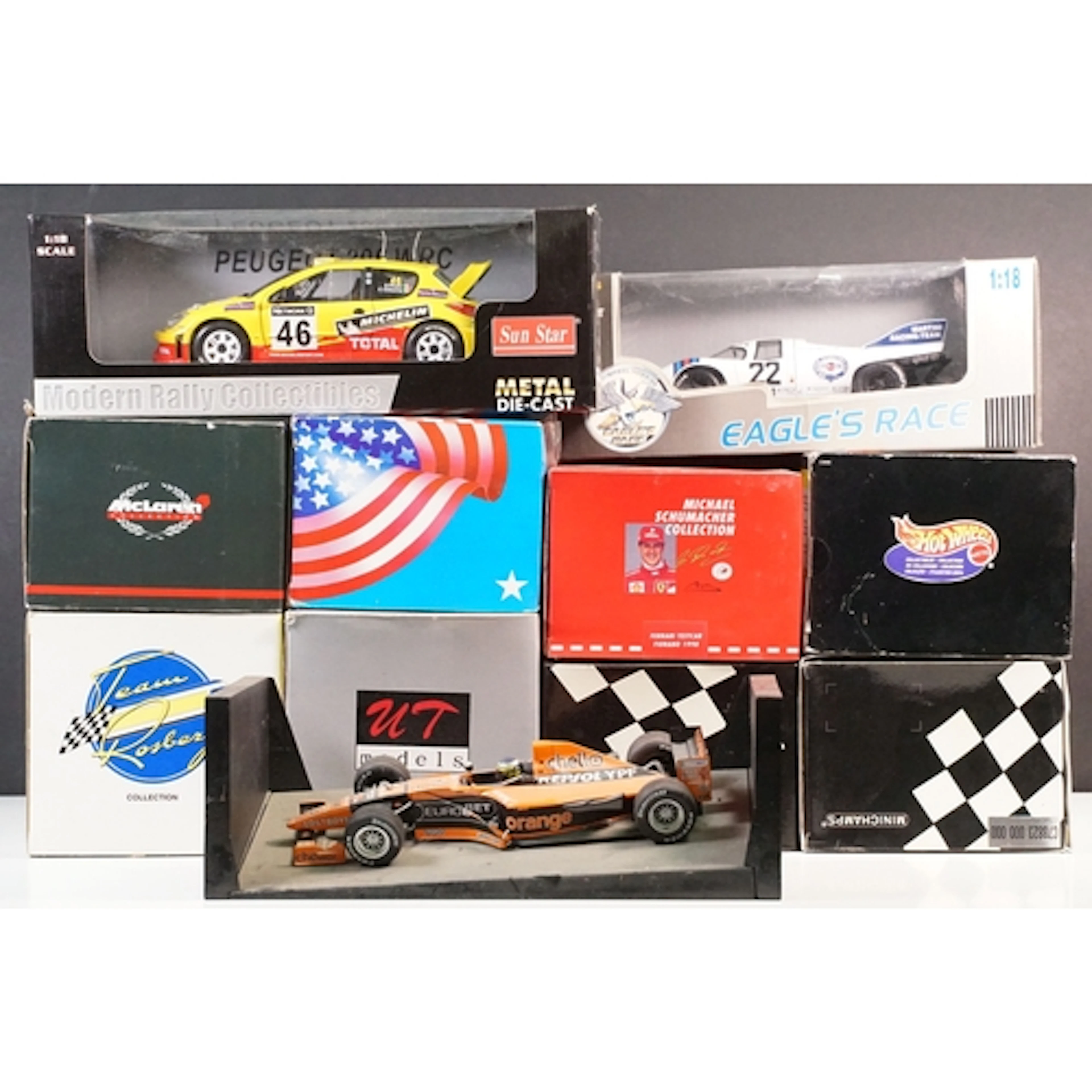 Ten boxed 1/18 scale diecast models to include Sun Star Mode...