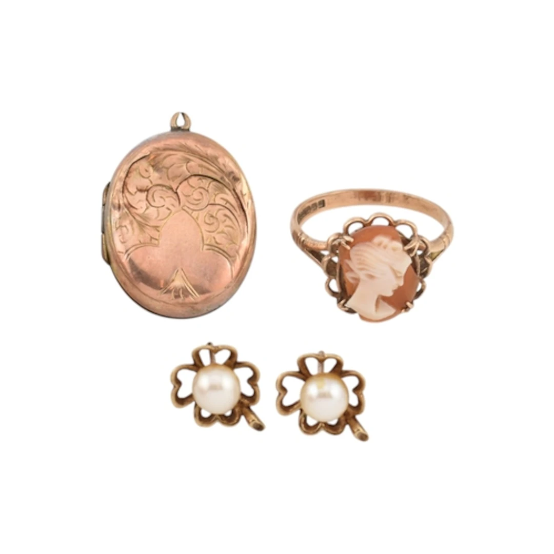 A selection of gold and rose metal jewellery. To include: a ...