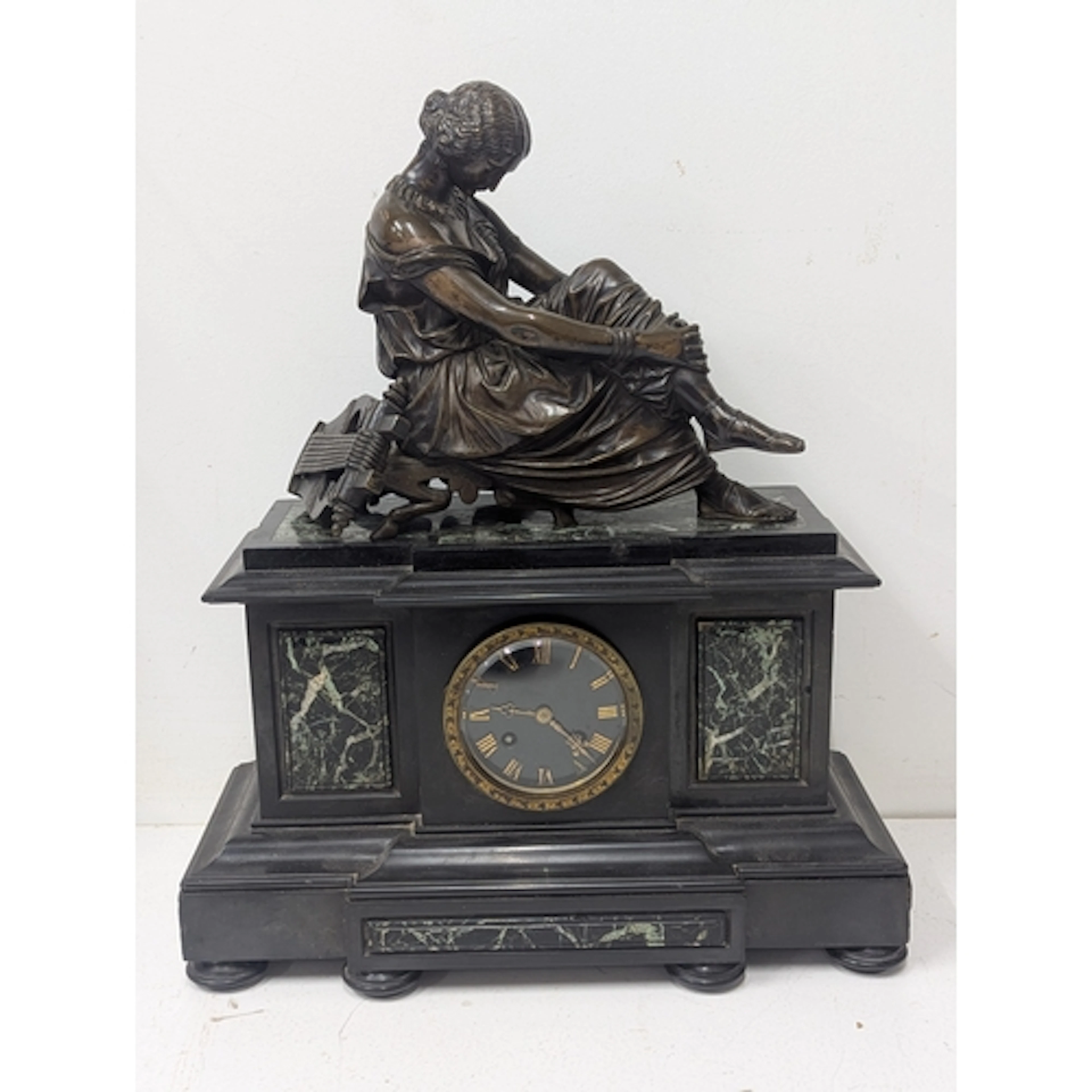 An 19th century French figural bronze and marble 8-day mante...