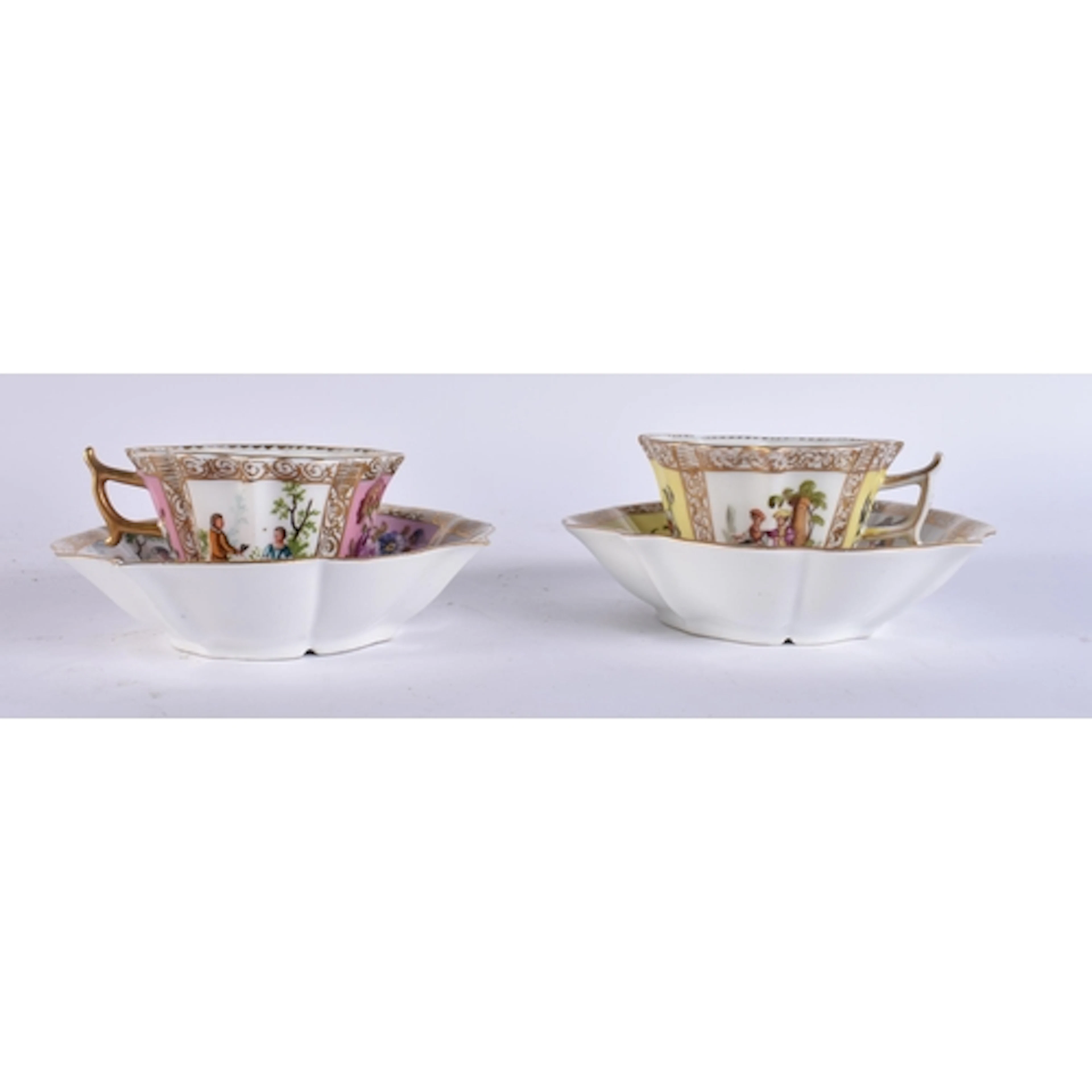 A PAIR OF AUGUSTUS REX DRESDEN PORCELAIN CUPS AND SAUCERS. 1...
