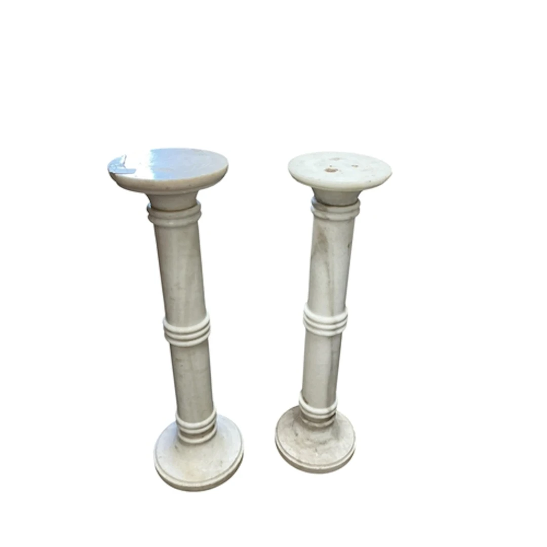 A pair of alabaster pedestals, diameter 26cm, height 93cm...