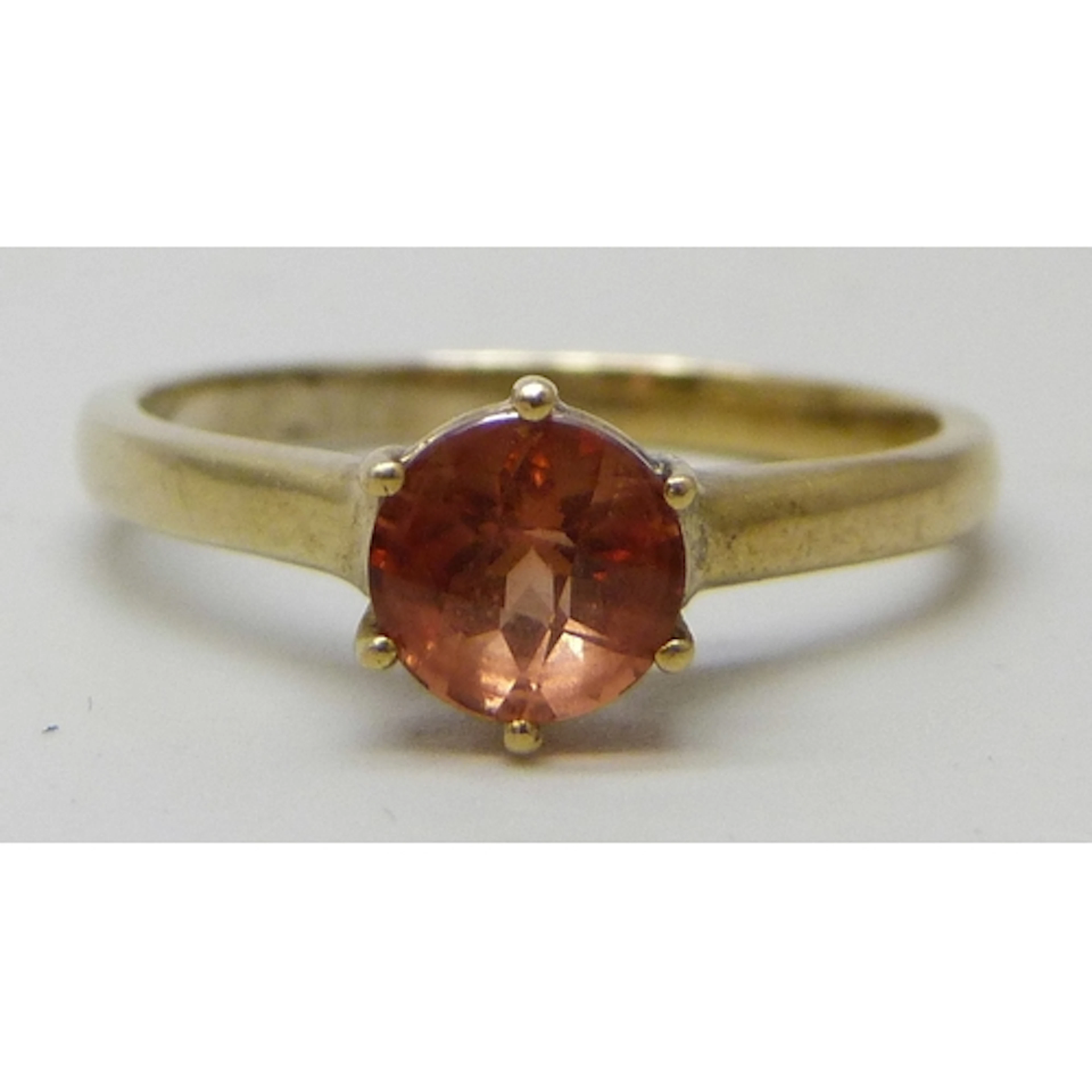 A silver gilt faceted possibly sunstone ring, O
