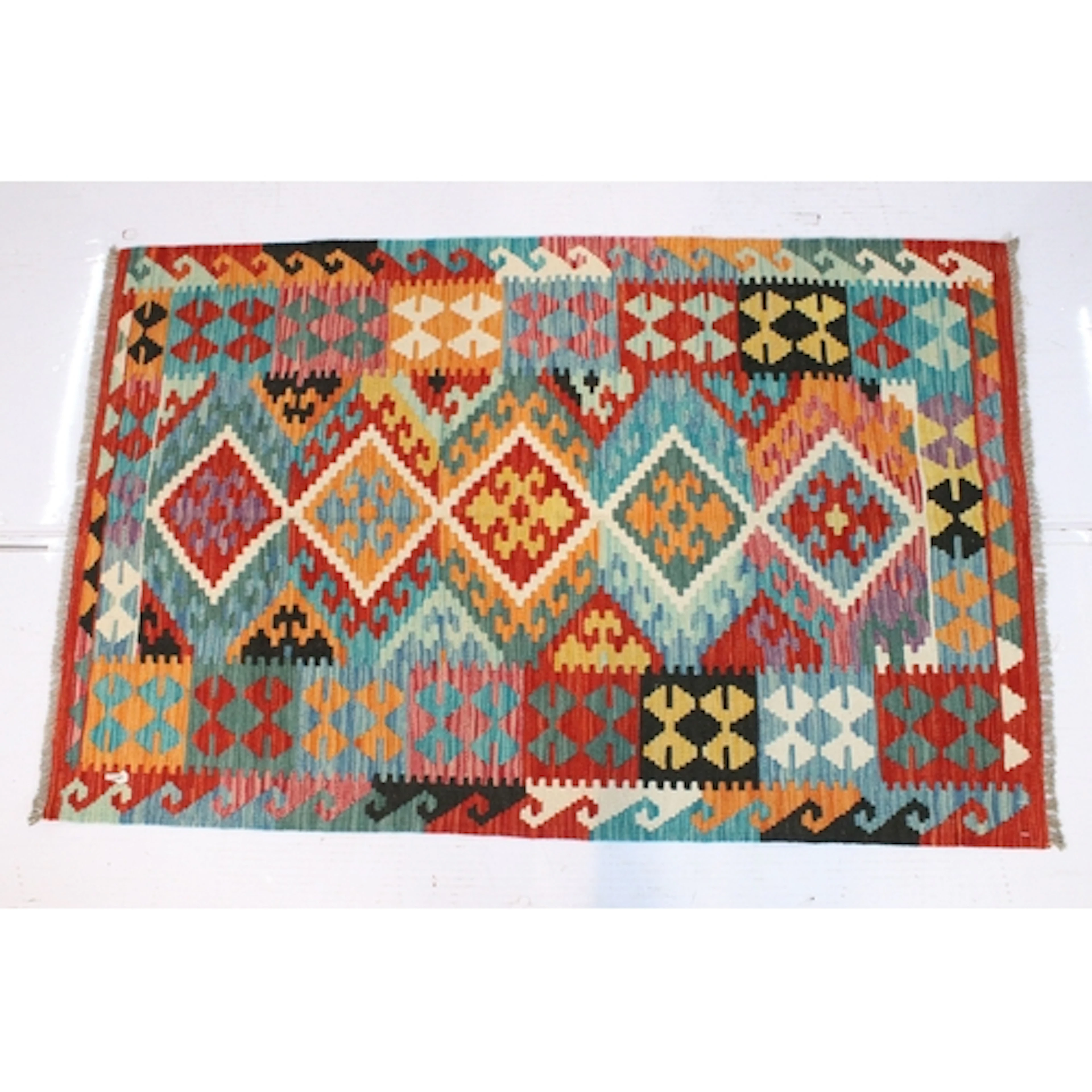 Chobi Kilim rug, having blue ground with orange, red and whi...