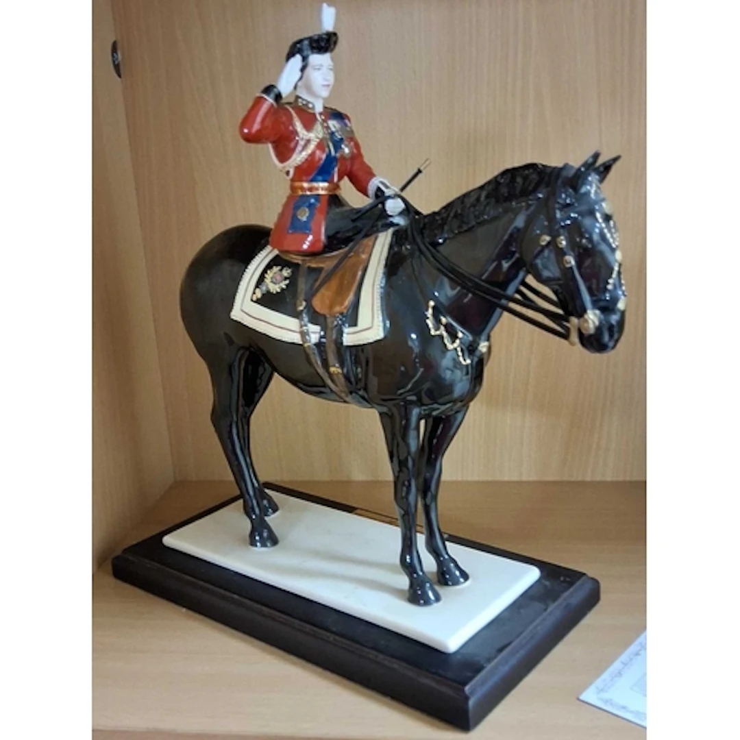 A LIMITED EDITION COALPORT FIGURE -TROOPING THE COLOUR, depi...