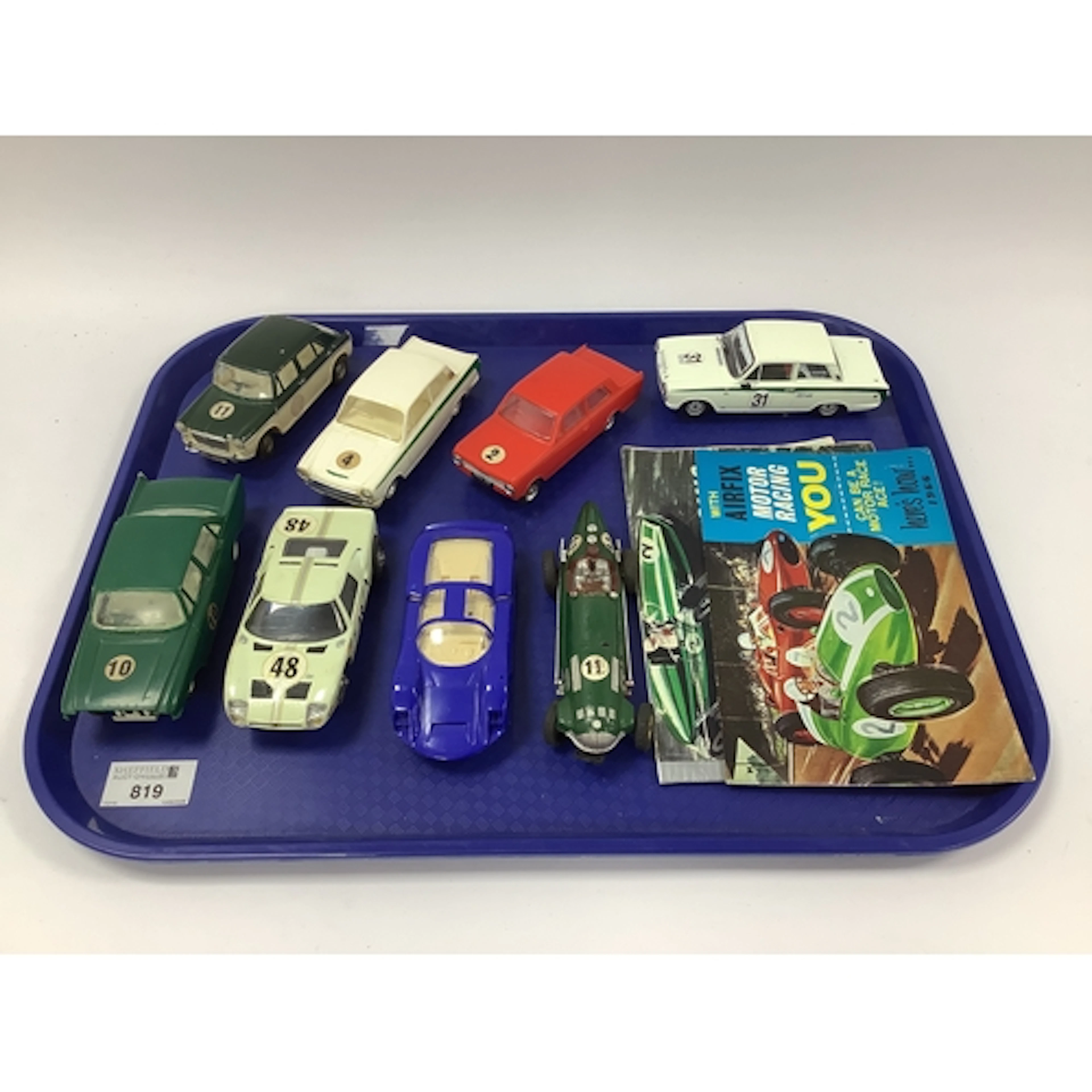 Seven kit built 1:32 scale slot cars. Mostly with a Sports/R...