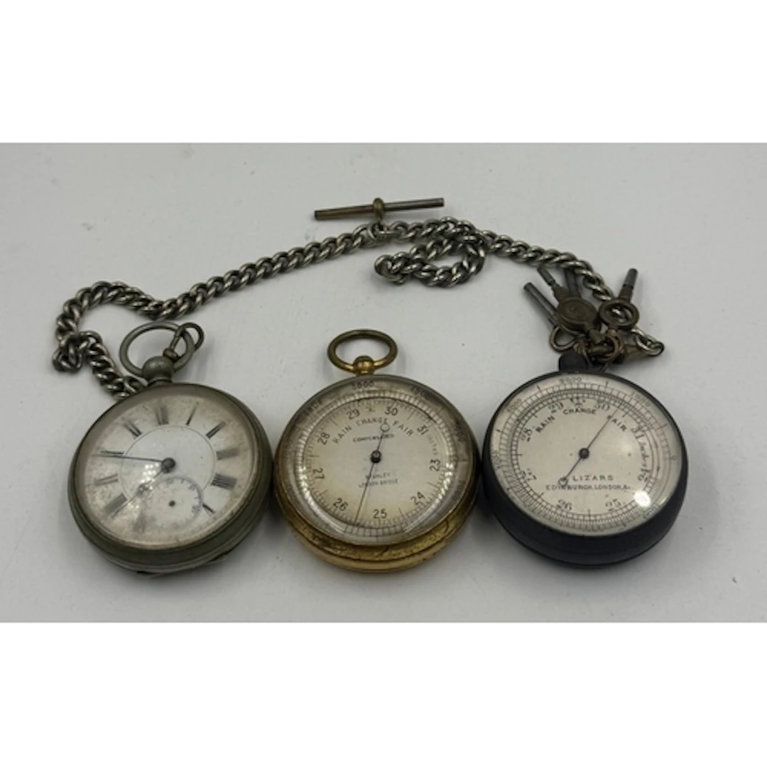 Two vintage pocket barometers together with a white metal po...