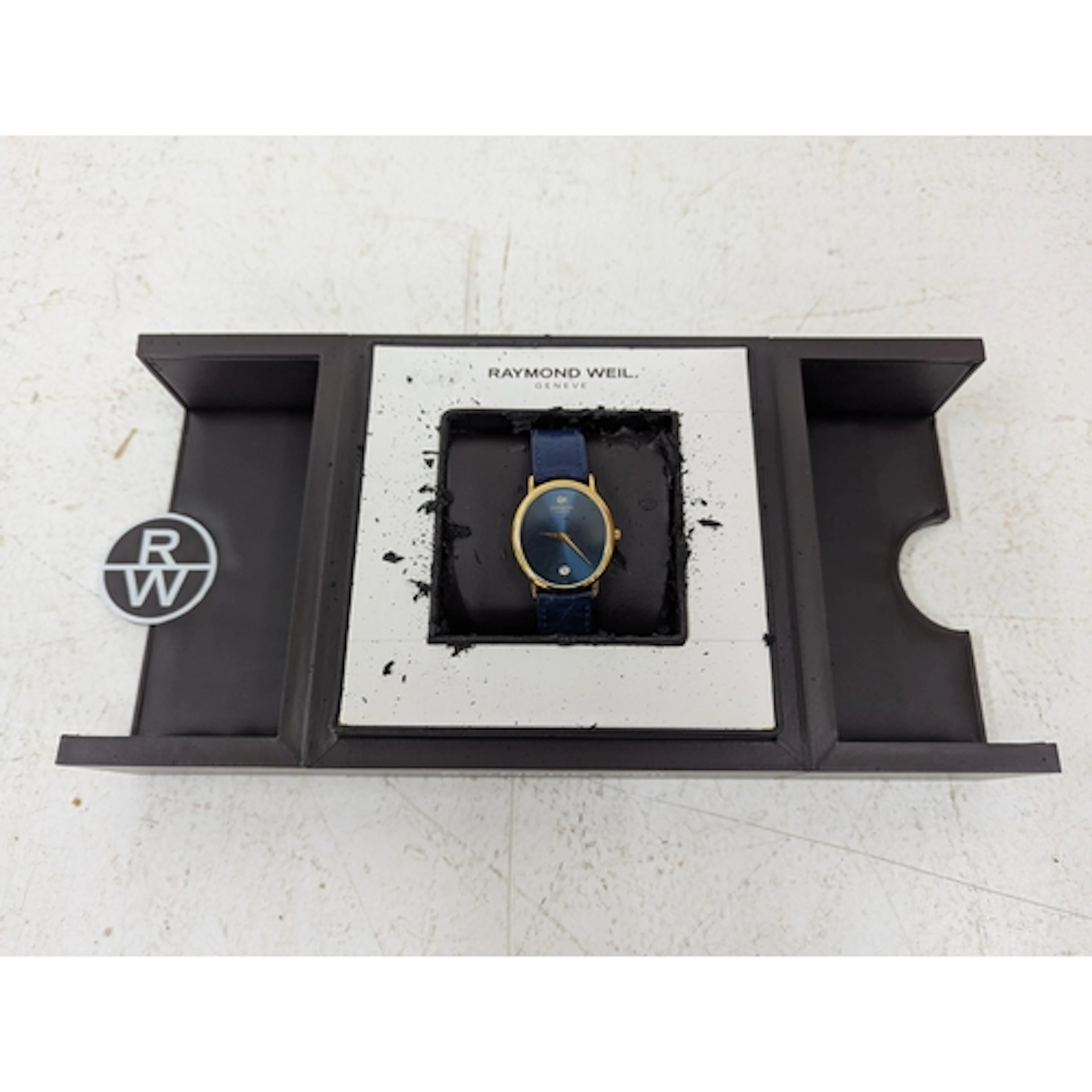A Raymond Weil wrist watch, with gold plated case, blue dial...