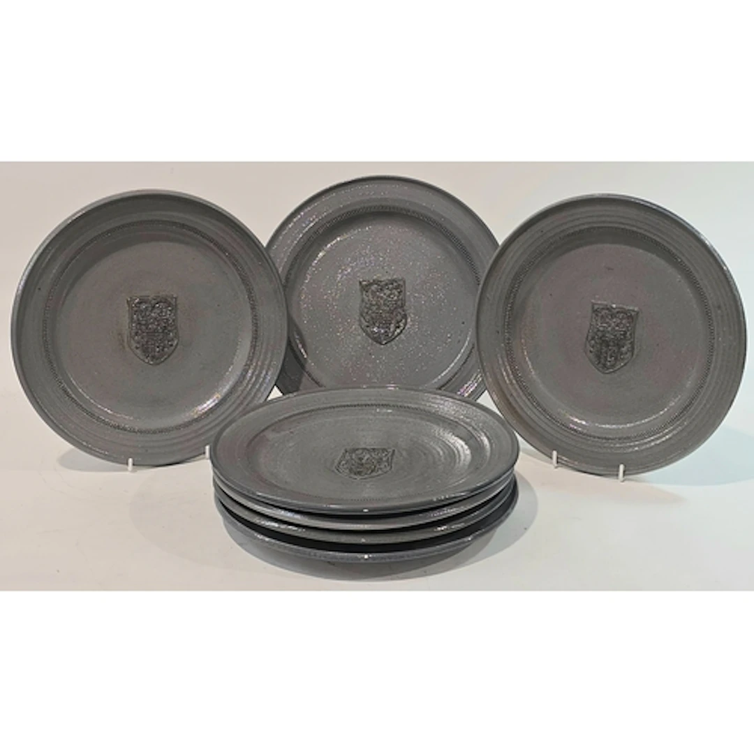 Poole Pottery interest Guy Sydenham group of 11" plates / pl...