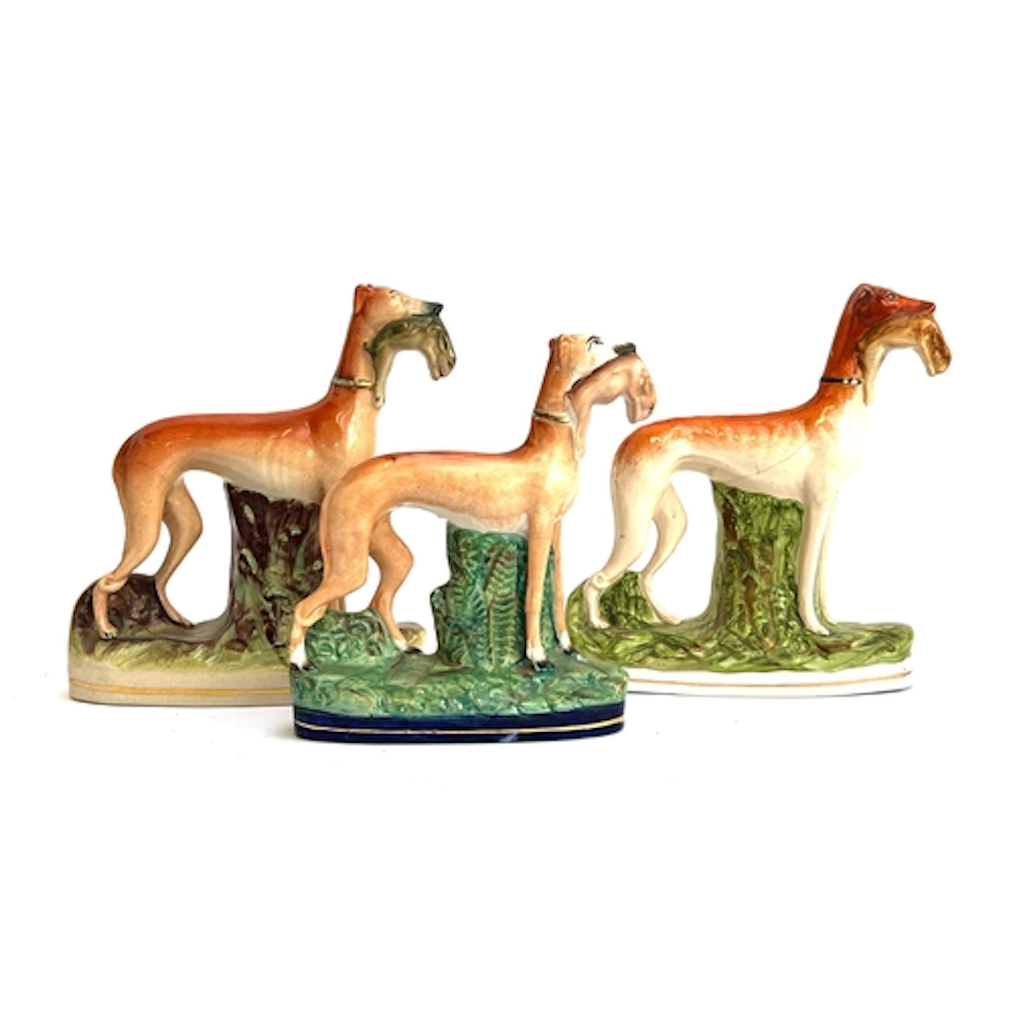Three late 19th/early 20th century Staffordshire flatback fi...