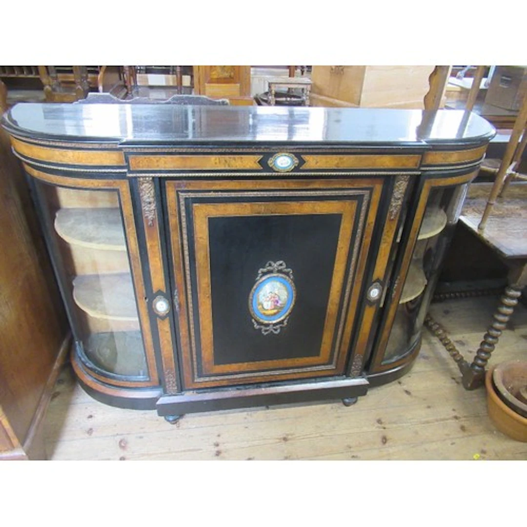 A Victorian Burr walnut and ebony Credenza having inlaid bur...