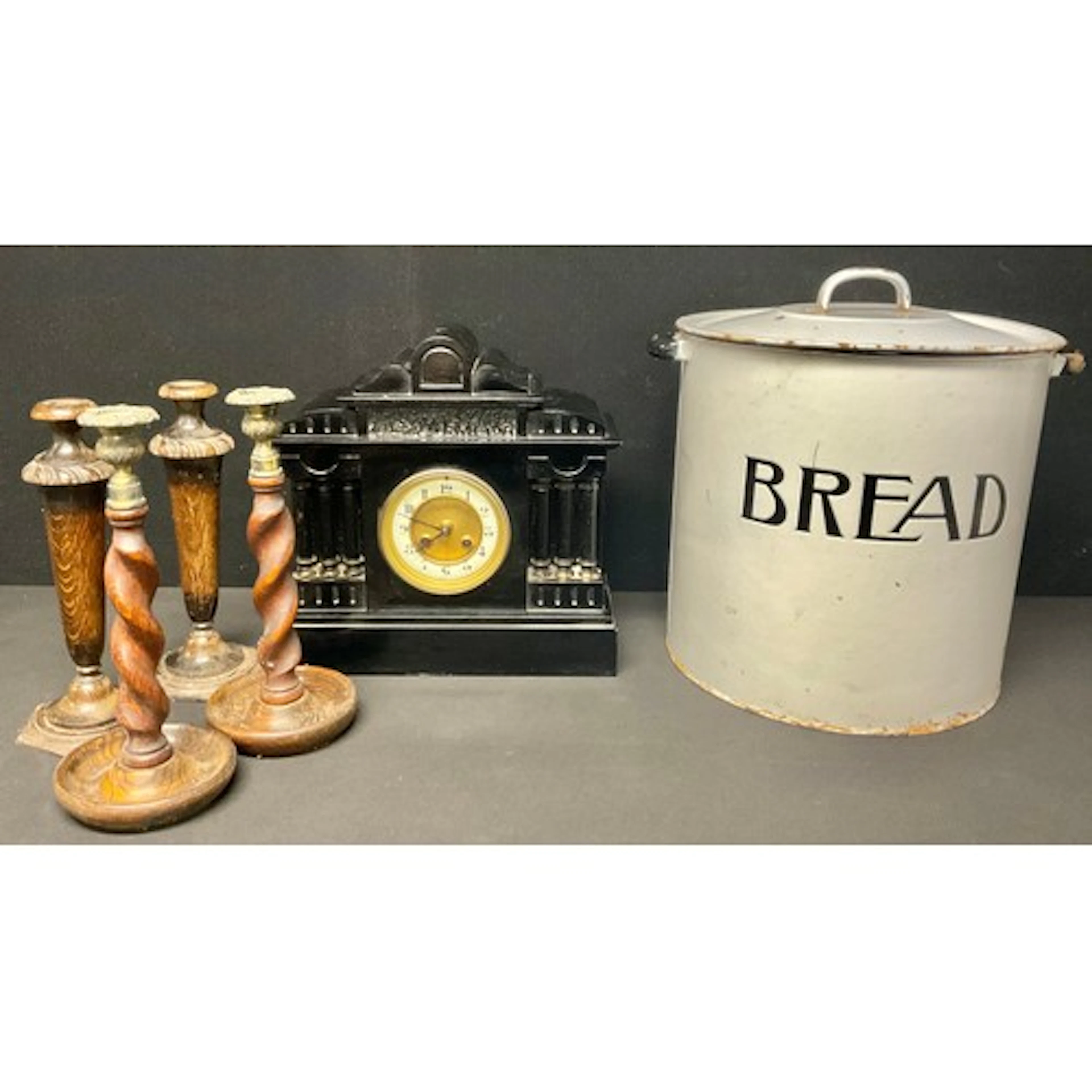 An early 20th century French black slate mantel clock; an en...