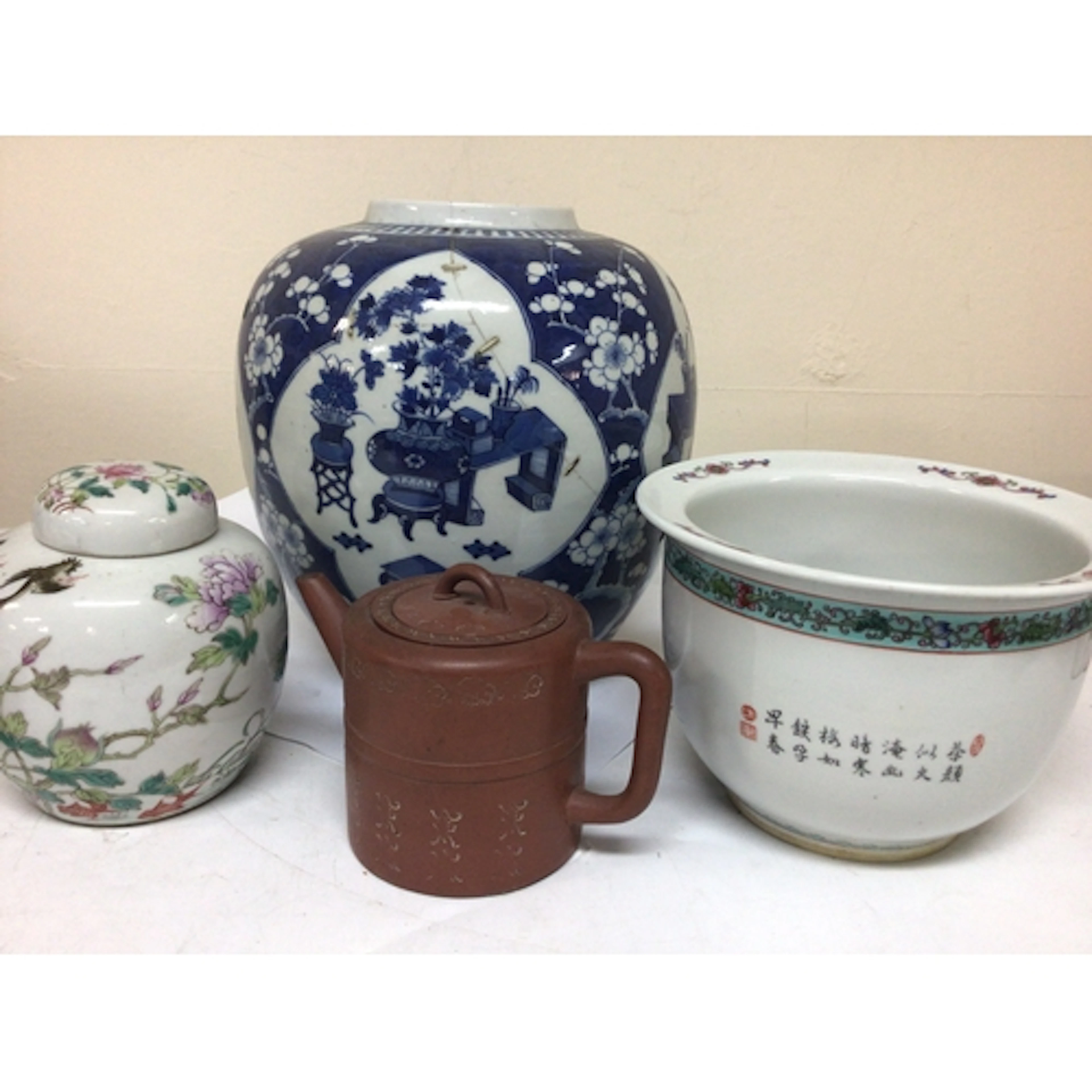 A Chinese Export porcelain blue and white jar (damaged...