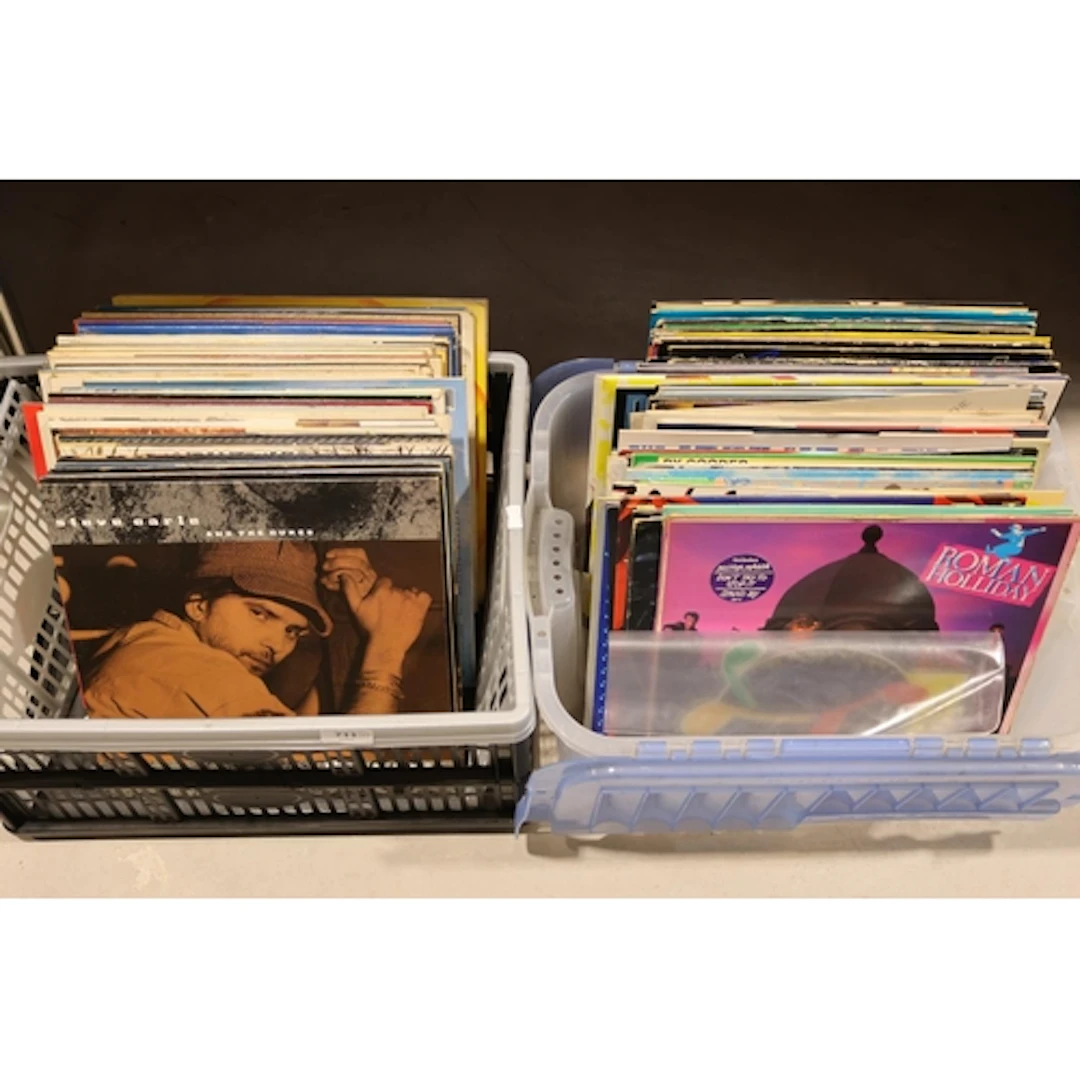 Two boxes of mixed vinyl records and 12'' singles, etc