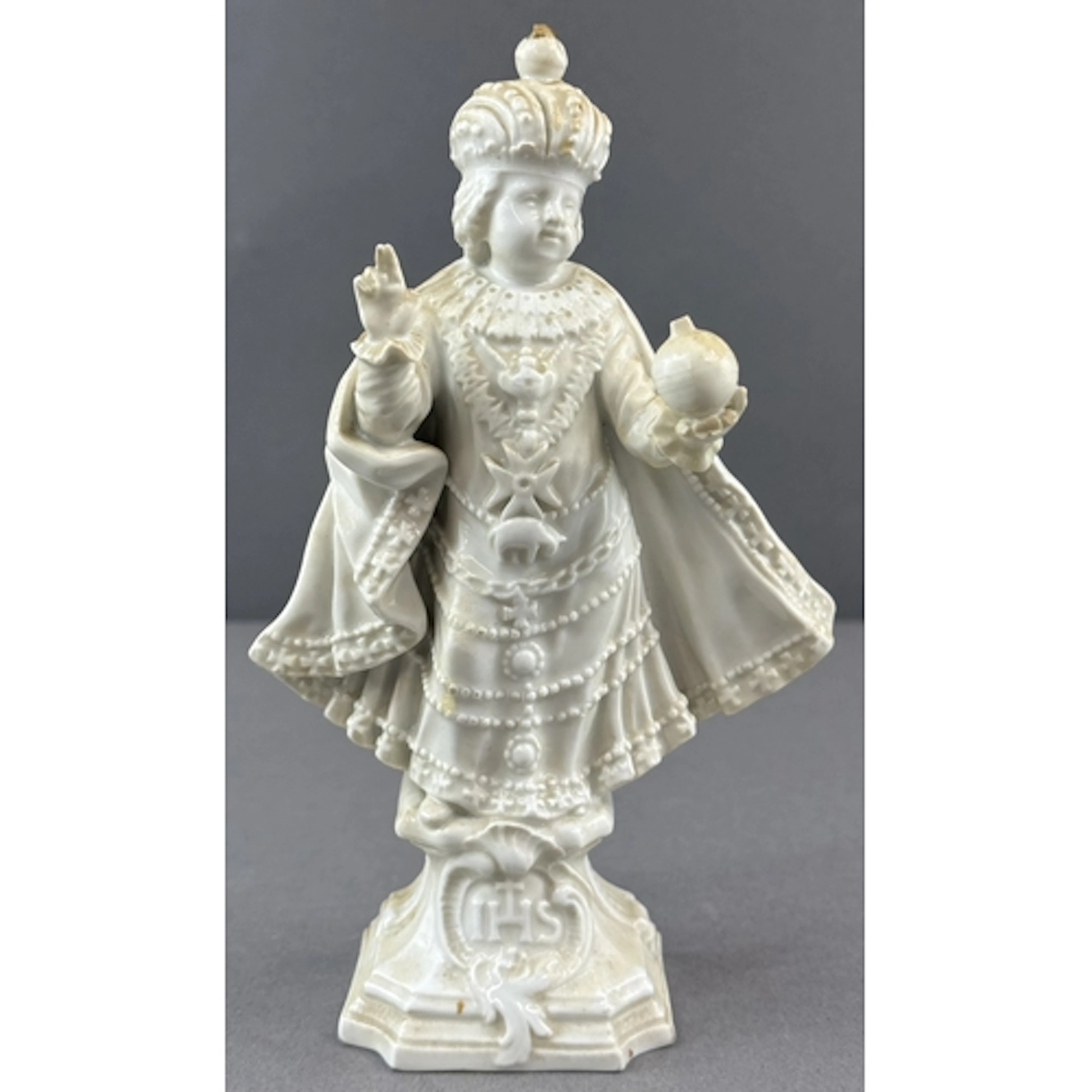Ceramics: a Meissen white glazed figure of the Infant Jesus,...